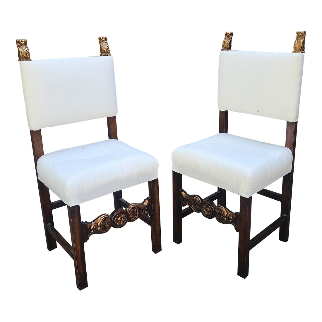 Pair of Hall Chairs With Giltwood Finials: Pair of vintage Italian made hall chairs or side chairs that need to be upholstered They have simple white cotton fabric that is not intended to be the upholstery fabric. These chairs have a carved ra
