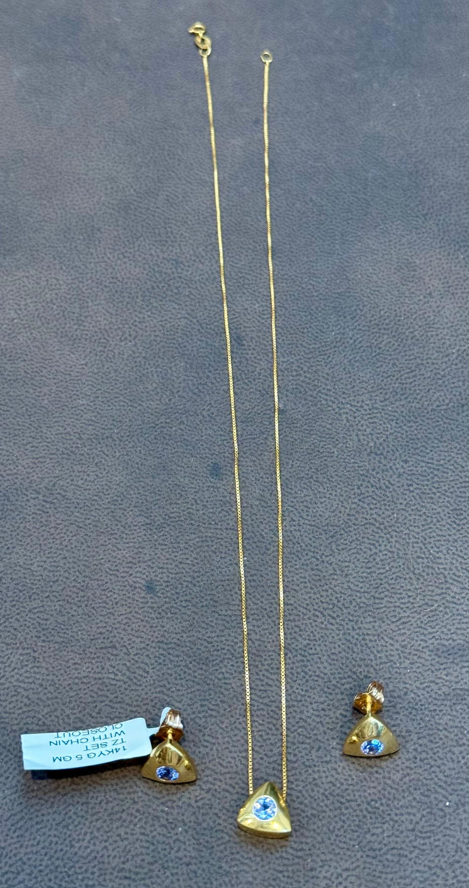 Three Piece Tanzanite Pendant & Earring Set In 14 Karat Yellow Gold with Chain - 10
