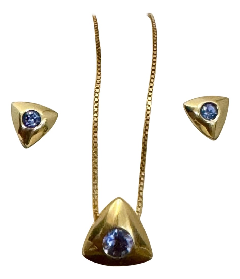 Three Piece Tanzanite Pendant & Earring Set In 14 Karat Yellow Gold with Chain: Three Piece Tanzanite Pendant & Earring Set In 14 Karat Yellow Gold with Chain Tanzanite Weight approximately 1 Carat, very good quality of Tanzanite , very fine desirable blue color 14 K gold Weight