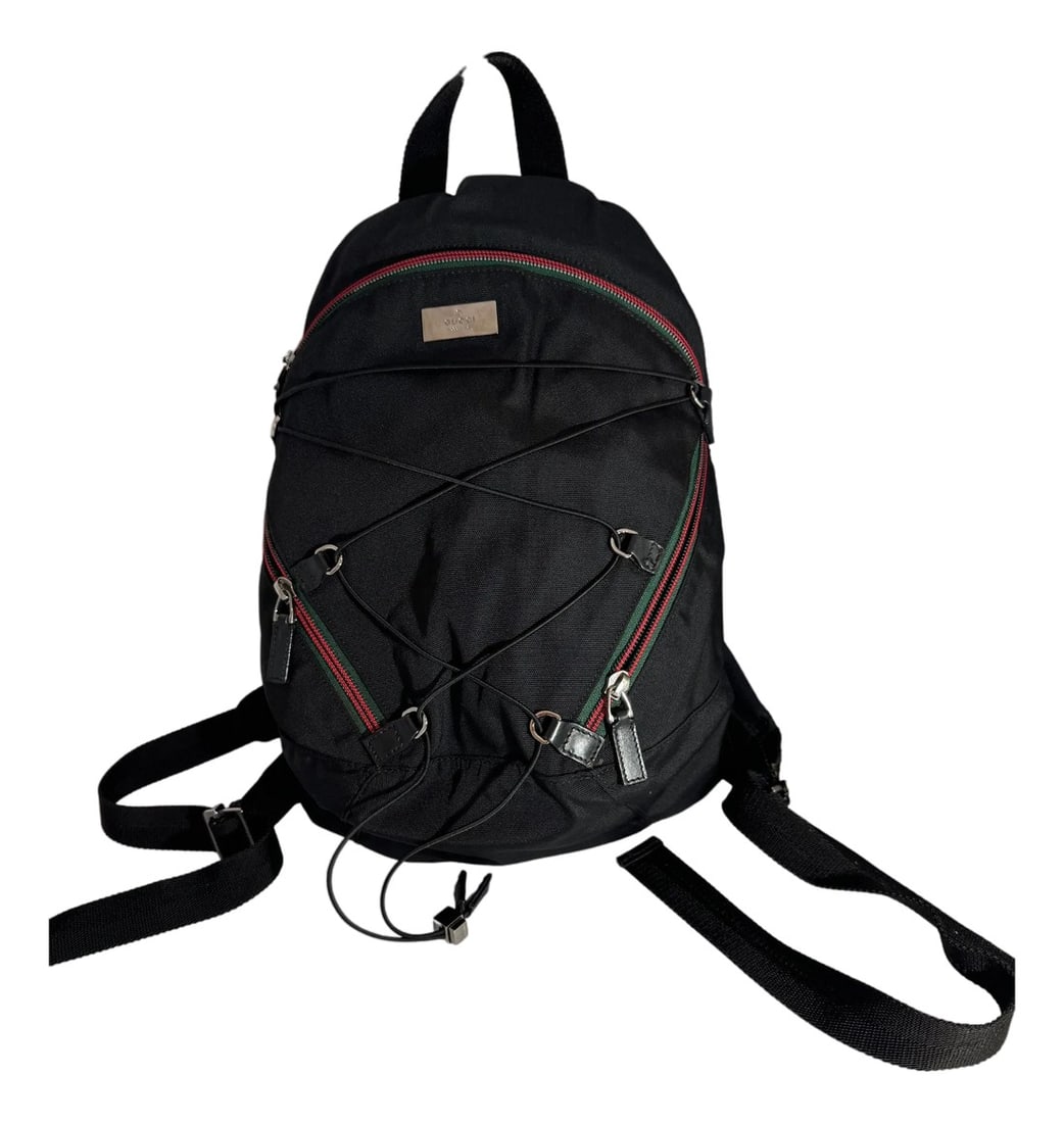 Gucci Vintage Black Nylon , Small Eden Day Back Pack Black, Made in Italy: This is an authentic Pre owned GUCCI Vintage Black Nylon , Small Eden Day Back Pack Black, Made in Italy. This stylish backpack is crafted of Gucci Nylon The bag features two external pocket, nylon