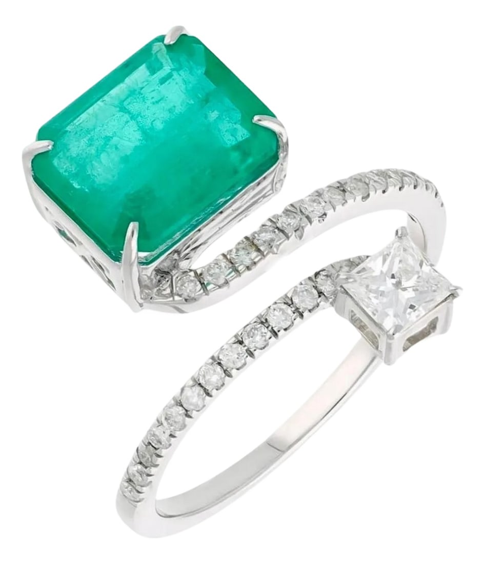 3.11 Ct Emerald Cut Emerald & 0.49 Ct Diamond Bypass Ring in 18 Kt Gold Size 6: 3.11 Ct Finest Emerald in Emerald cut Shape & 0.49 Ct Diamond Ring in 18 Kt Gold Size 6.25 Its a brand new Piece A Classic, bypass Emerald cut emerald ring featuring a stunning 4.85 Ct finest Zambian