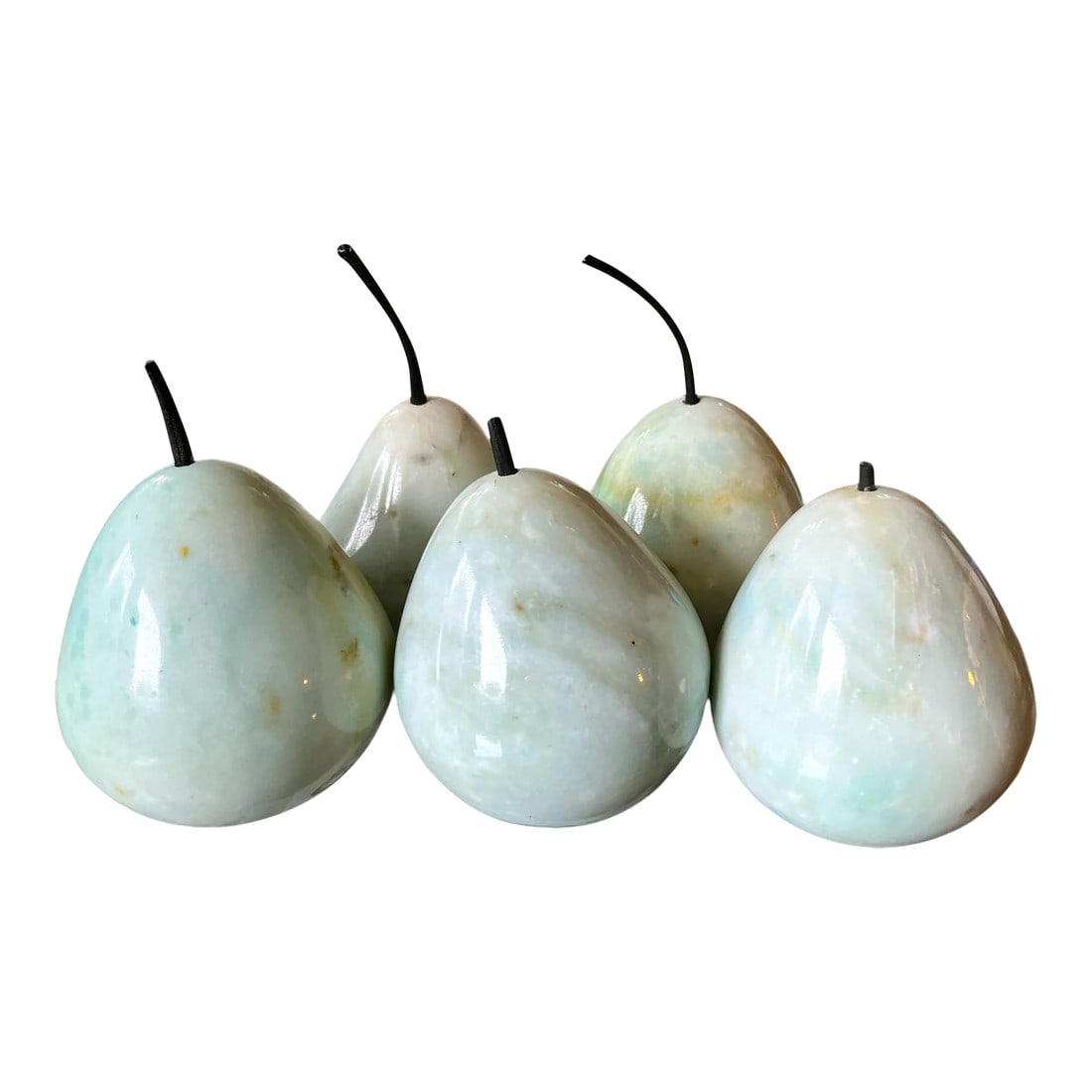 Set of Five Hand-Carved Marble Pears – Soft Aqua Green: A charming collection of five carved marble pears in a serene, soft aqua-green colorway with beautiful natural veining and warm golden mineral inclusions. Each fruit is uniquely shaped, highlighting t