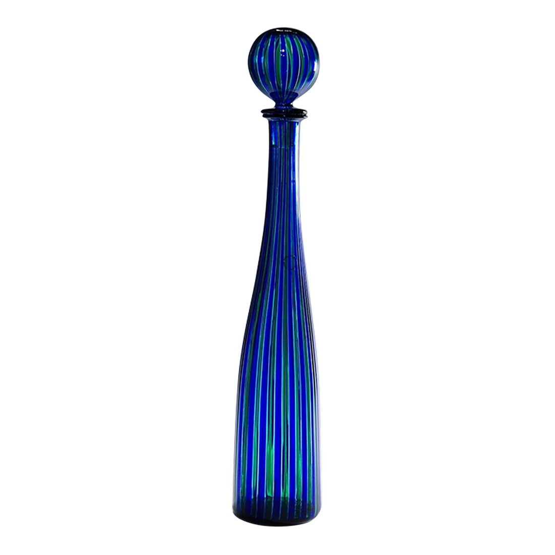 Venini a Canne Bottle 'Elixir' by Gio Ponti Venice Murano: Venini A Canne Bottle 'Elixir' by Gio Ponti Venice Murano A vintage bottle 'a canne' with polychrome rods in blue, green, and transparent glass. Manufactured in 1989 by Venini, Venice. The Elixir