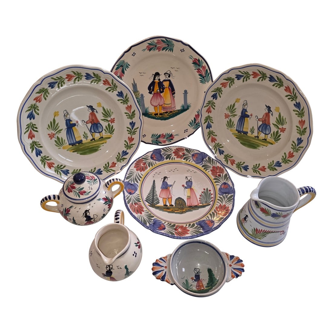 Collection of Eight Quimper French Faience Serveware Pieces: Nice collection of French Quimper Serveware consisting of two more modern made plates and two older plates, a sugar Pot and creamer, a larger pitcher and a porringer. Condition: Alterations: Original 