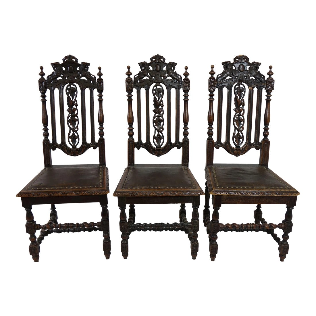 19th Century Tall Decoratively Carved Chairs 3 Piece Set: 3 Amazing Antique Chairs (19" x 21" x 45") Decoratively Carved, Tall Wooden Chairs Leather Seat Condition: Alterations: Original Condition Unaltered Imperfections: Some Imperfections Condition Notes: