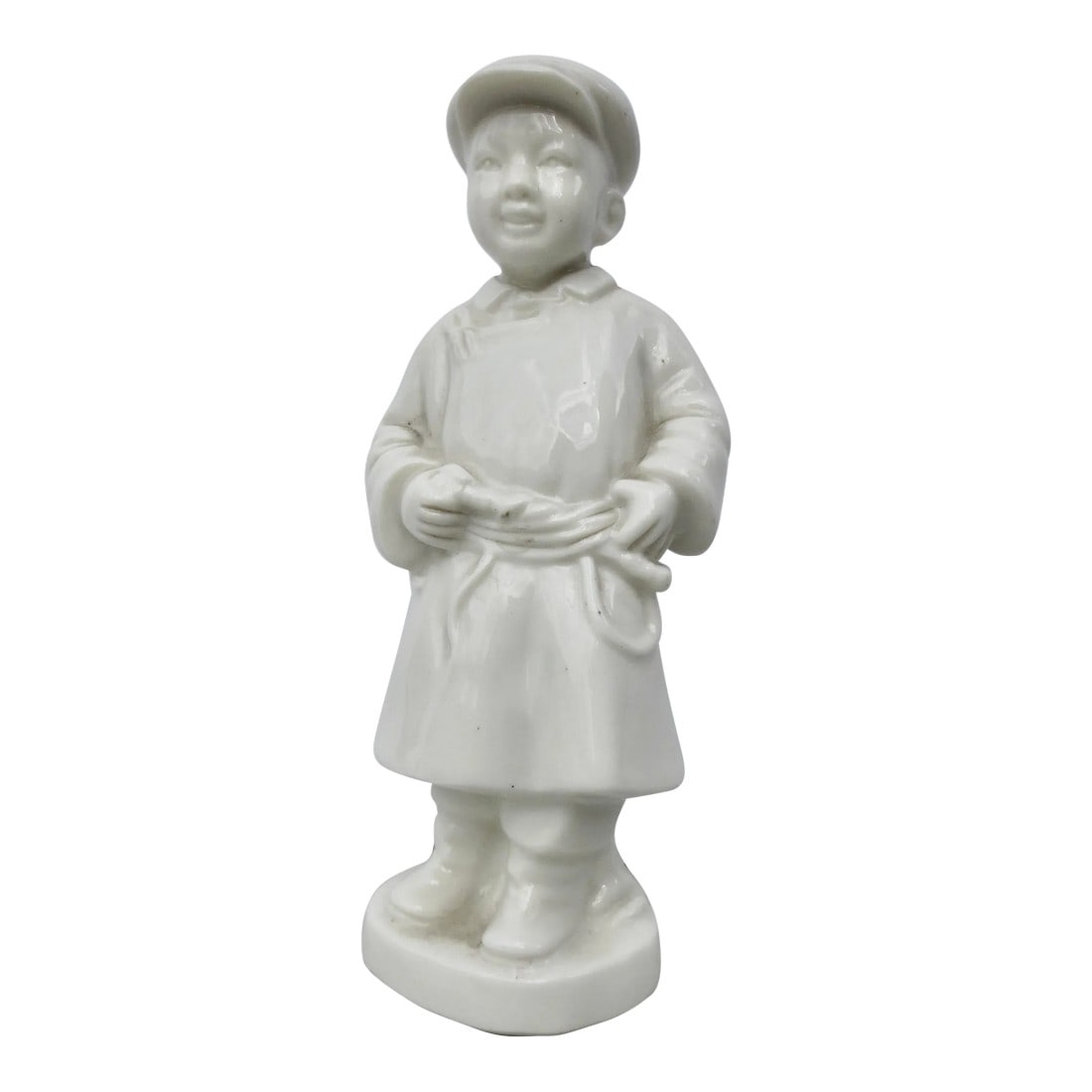 1980s Chinese Peoples' Republic Porcelain Boy: White Porcelain, Blanc de chine of a young Mao. A classic image of the young man in his winter coat and Red Army cap. Porcelain image that is 2.5" by 2.25" overall base, 7" tall. Very good condition. 