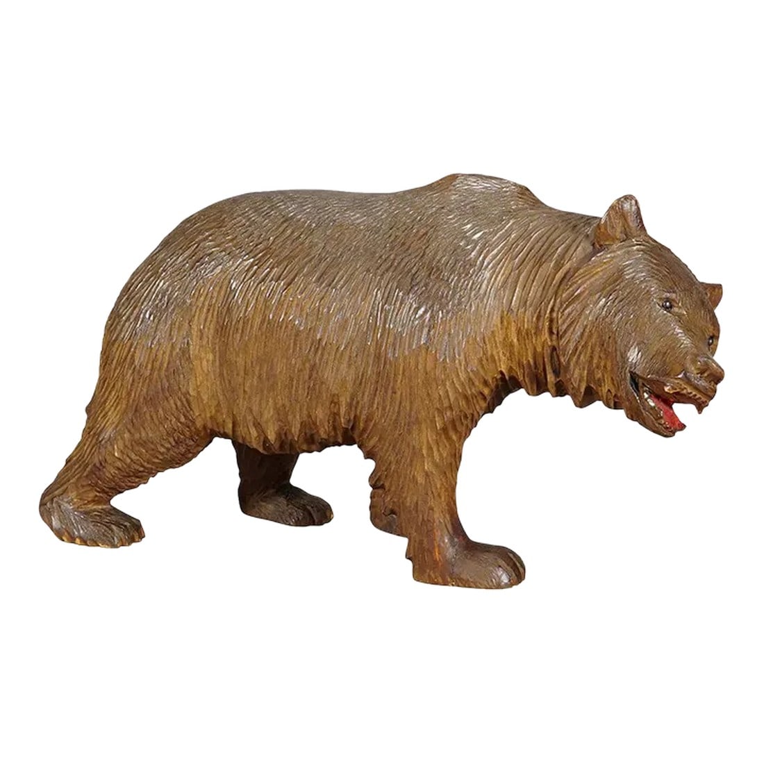 Large Vintage Wooden Strolling Bear Handcarved in Brienz Ca. 1930s: Large Vintage Wooden Strolling Bear Handcarved in Brienz ca. 1930s A large vintage statue of a walking bear. Made of lindenwood, finely handcarved with naturalistic details in Brienz, Switzerland ca.