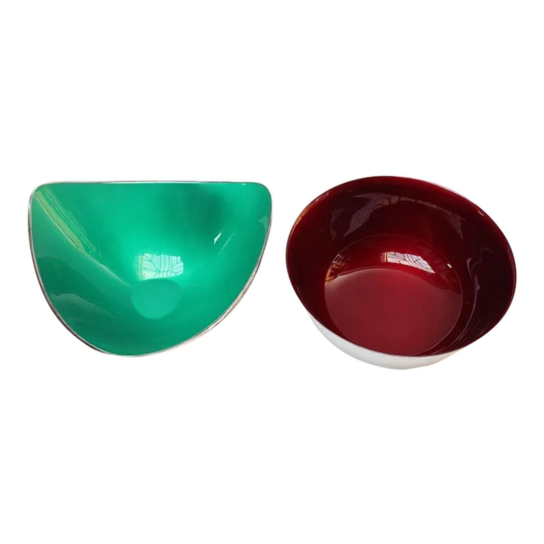Set of Two Mid-Century Reed and Barton "Color Clad" Green and Ruby Red Silver-Plated Bowls: A set of two 'color-glazed' silver-plated bowls designed by metal smith, John Prip and introduced by Reed and Barton as the "Color-Clad" line in 1961. Reed and Barton offered color glazes resembling