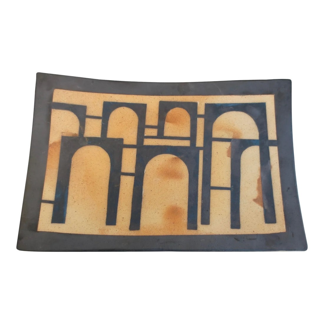 Berey Pealing Modern Stoneware Table Center Piece: Bisque ware Terra Cotta handmade tray. Two color designs of a carbonized pattern of arches on the face and on the reverse square patterns. The face with a black border. The size is 13.5" by 9" and 2"