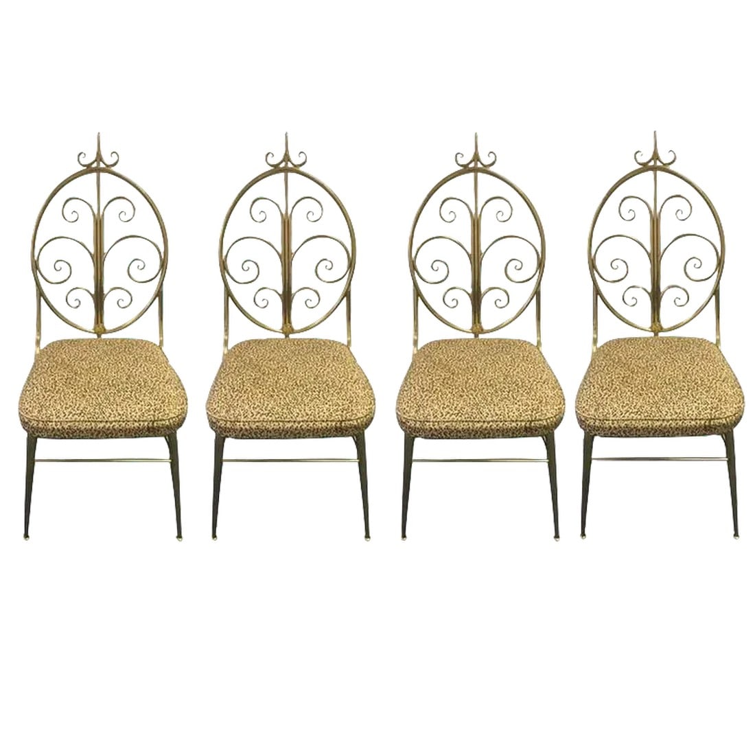 Mid-Century Modern Brass Dining Chairs - Set of 4: Four very chic Italian polished brass dining chairs with a wonderful whimsical curlicue motif. Seats are upholstered in the original faux leopard cotton. 42.75 in.Hx17.5 in.Wx17.5 in.D Brass is