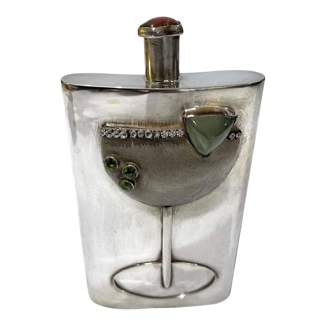 Montana Margarita Sterling Silver and Gemstone Flask by Carol Helvey-Woolsey: Raised on a ranch in Central Montana - Carol "Caye" Helvey-Woolsey is considered one of the west's preeminent metal smiths. Today she leverages her heritage and legacy to create fine jewelry and metal