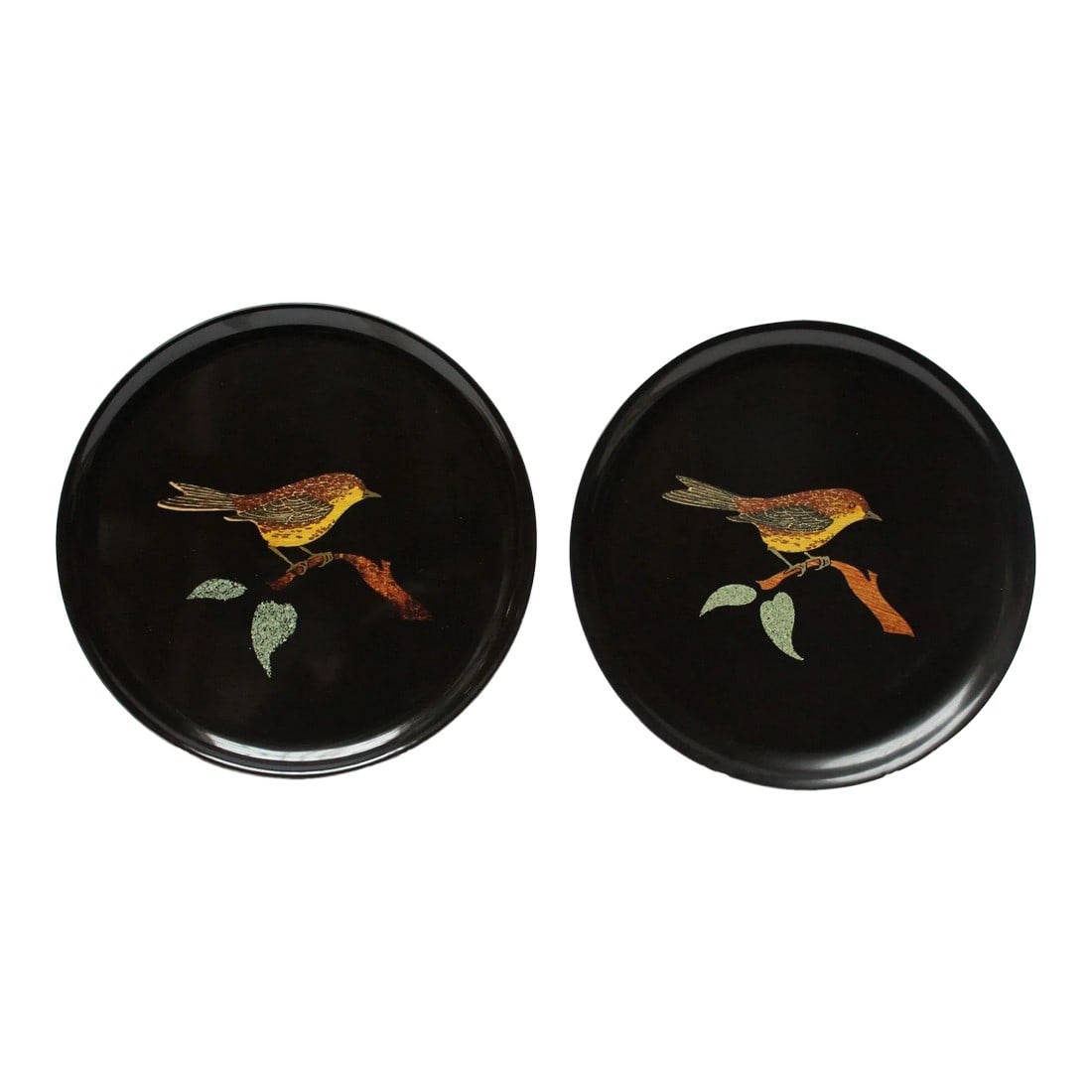 Pair of Mid-Century Black Resin Inlaid "Bird" Plates by Couroc: Pair of 1960s round decorative dishes/hors d'oeuvre plates/ashtrays by Couroc of Monterey, California with inlaid yellow-breasted birds on branches (potentially yellow-breasted chats). Composed of a b