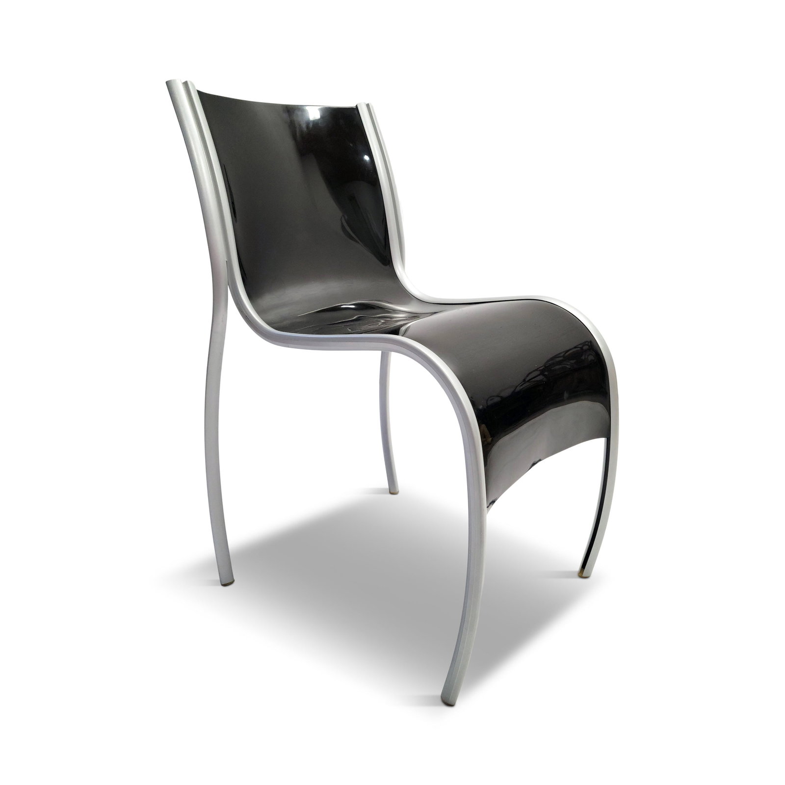 Signed Black FPE Chair by Ron Arad for Kartell: The Fantastic Plastic Elastic chair, aka FPE, is a lightweight, stackable chair designed by Ron Arad for Kartell. With soft lines and bright colors, the FPE's unique design joins a single sheet of pla