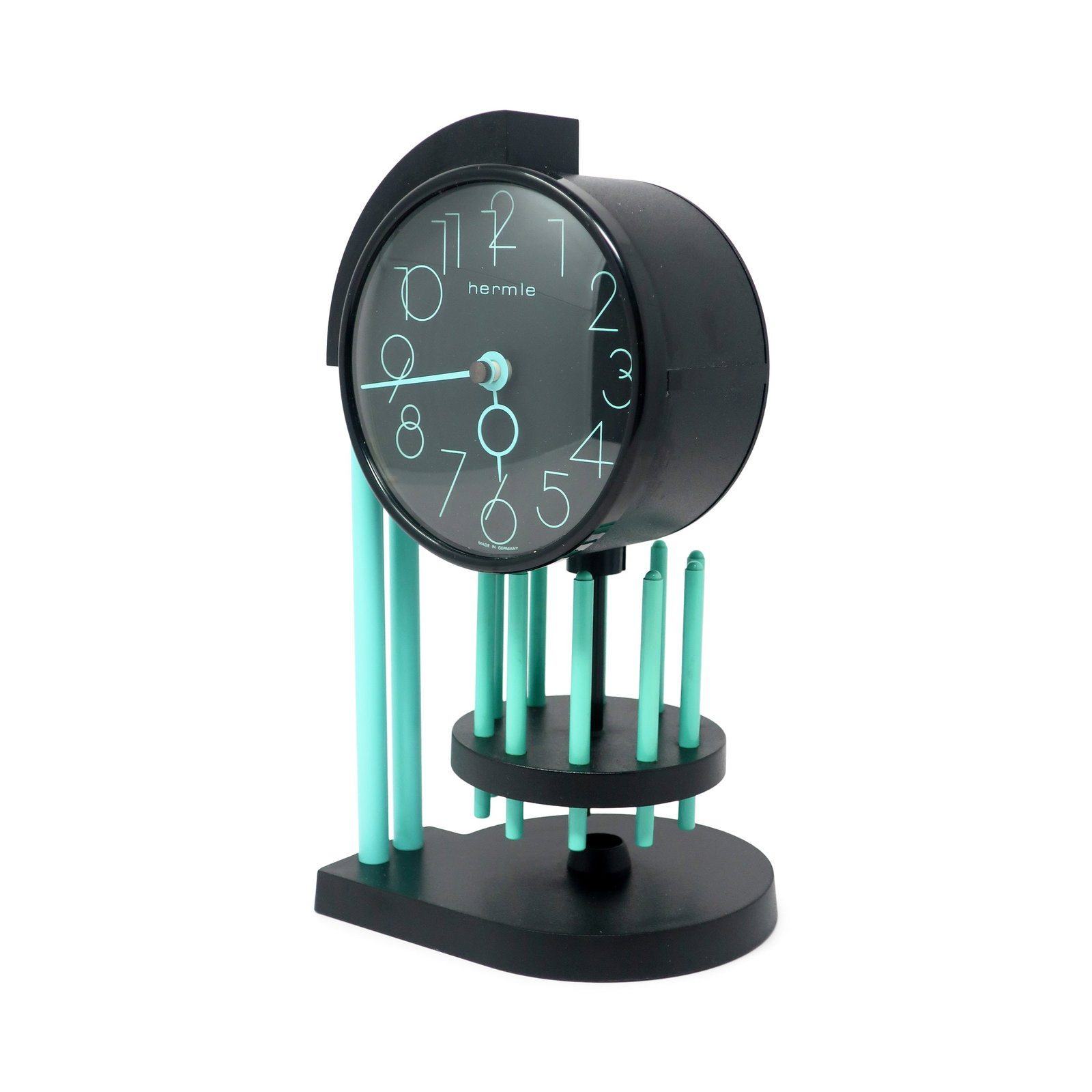 1980s Desk or Mantle Clock by Hermle: An outstanding black and aqua blue desk or mantle clock by Hermle, a 100 year old German clockmaker. With all of the panache of the postmodern era, this clock most likely dates from the mid-1980s. It 