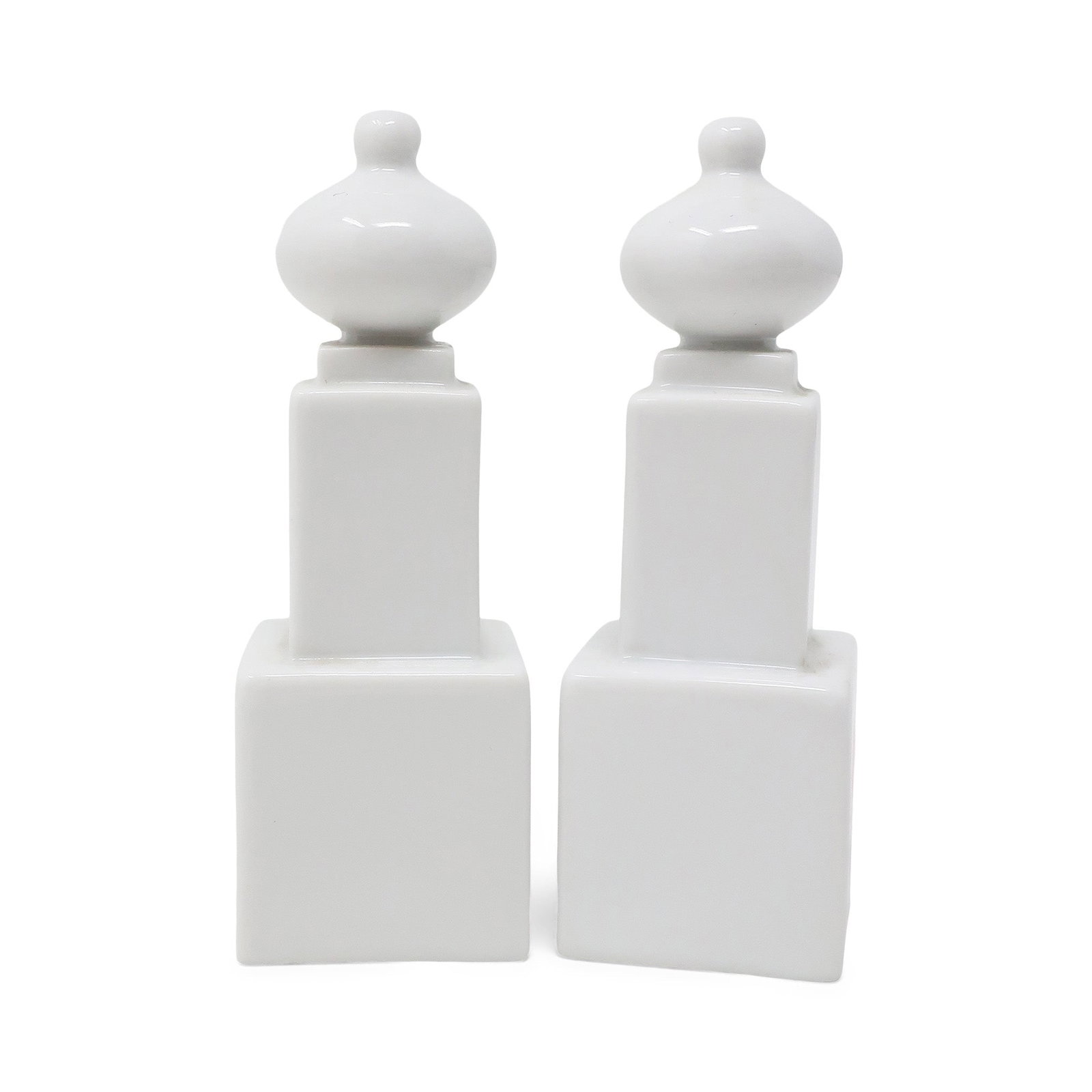 Porcelain Monumenti Salt & Pepper Shakers by Matteo Thun for Arzberg, 1987: This pair is part of a series of 6 'Monumenti' pepper & salt shakers, inspired by ancient buildings and monuments designed by Matteo Thun for Arzberg in 1987. Thun is a well-know Italian architect, de