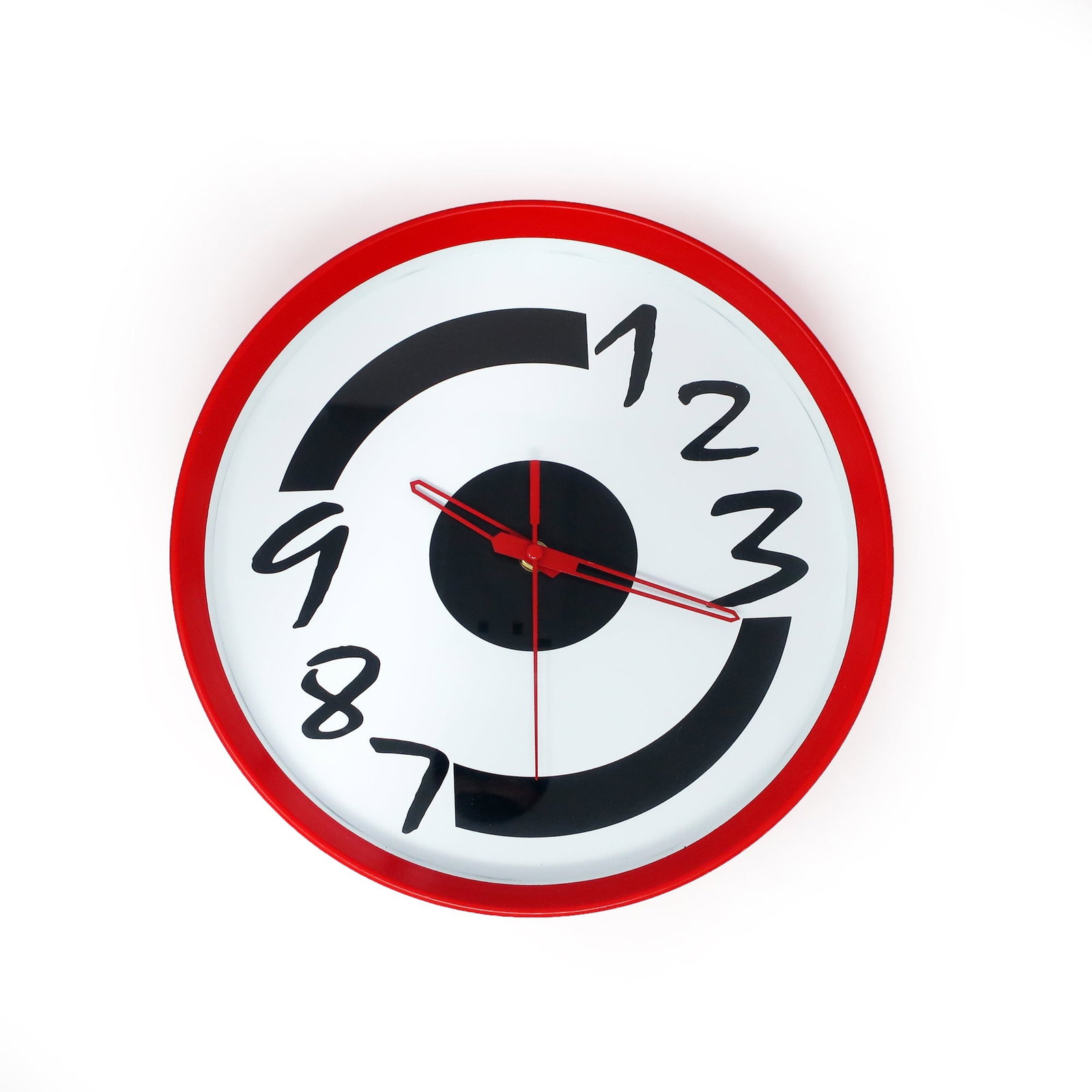 1980s Postmodern Red Wall Clock: A super fun new old stock 1980s or 1990s clock. Red case, white face with stylized black numbers, and red hands. In very good vintage and unused condition in original box. Takes a single AA battery.