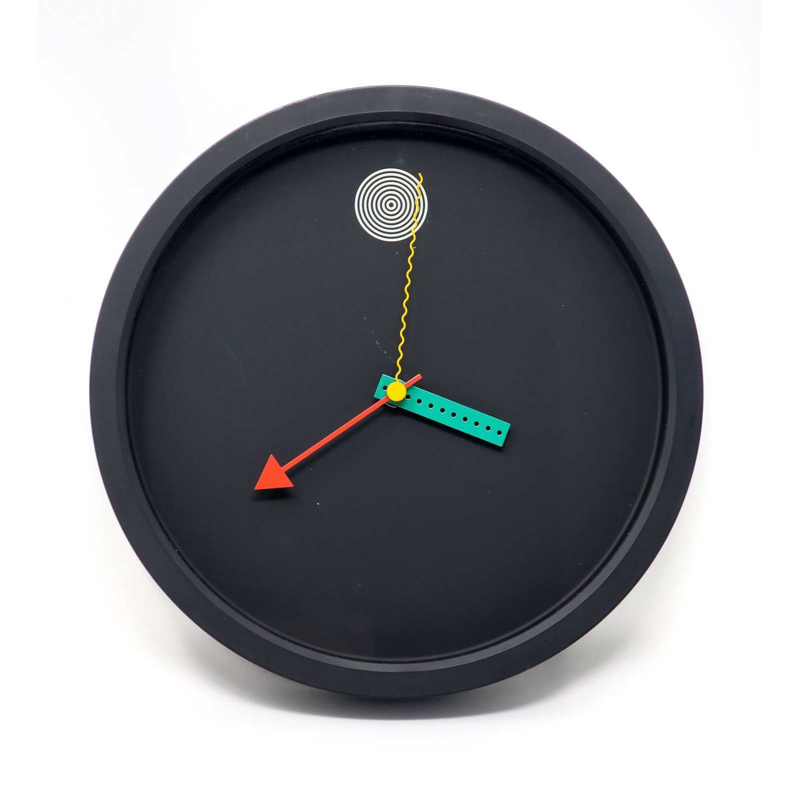 1980s Postmodern Wall Clock by Shohei Mihara for Wakita: A perfectly elegant and sophisticated 1980s wall clock designed by Shohei Mihara for Wakita. Postmodern, Memphis-influenced design at its finest! Black with white, red, green, and yellow accents.