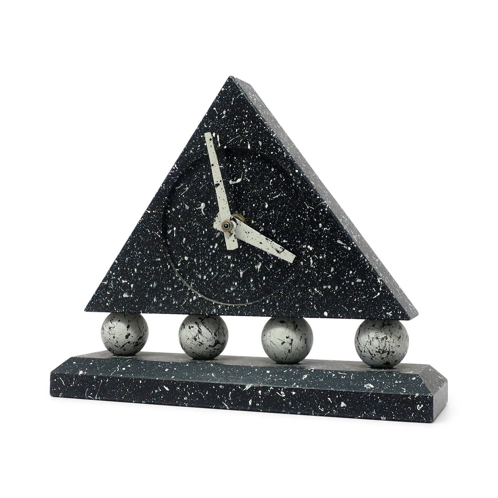 1980s Triangular Black Splatter Paint Desk Clock: A stunning postmodern desk clock with dark gray rectangular base, round light gray supports, and dark gray triangular body with white hands. The bold colors were then splattered with contrasting