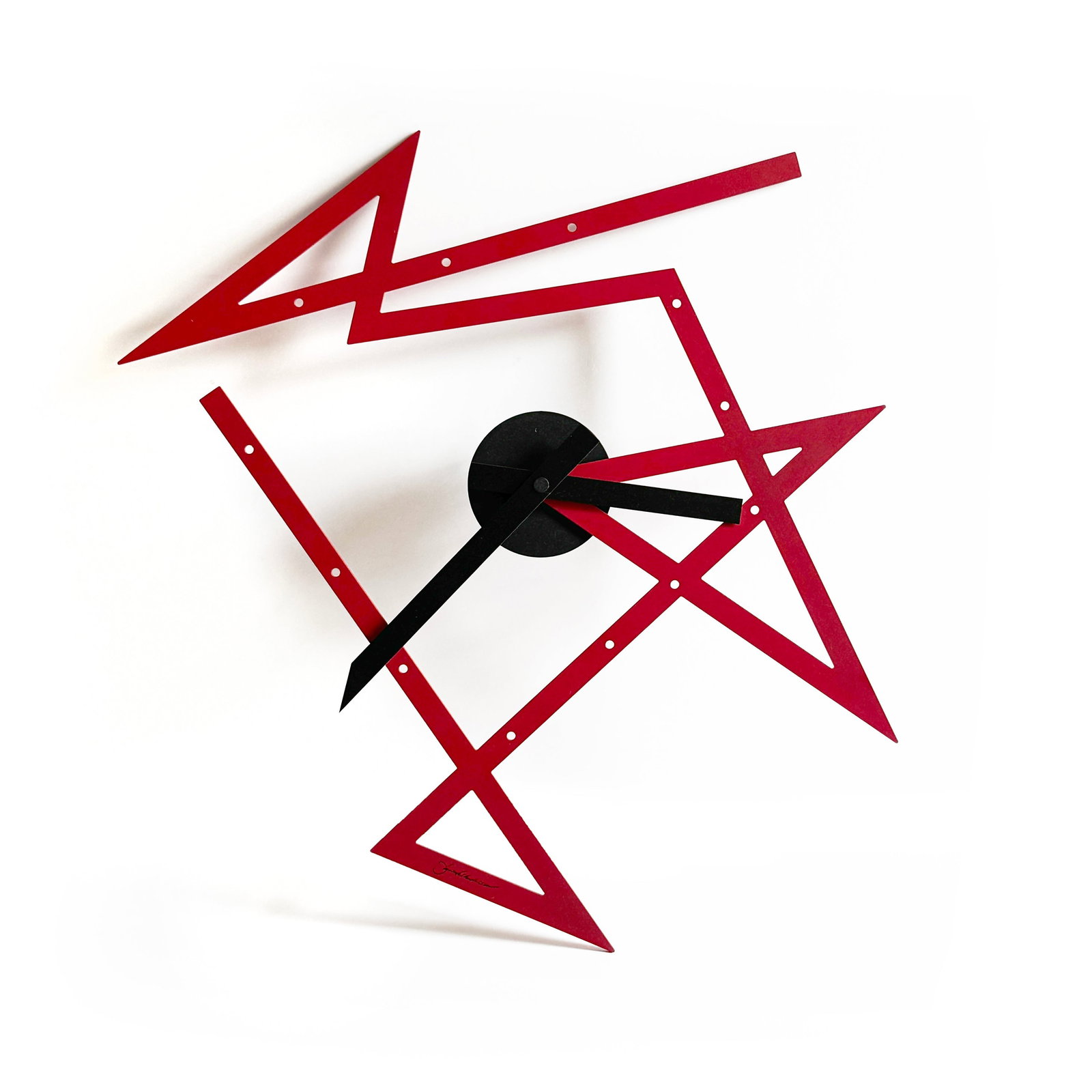 Time Maze Wall Clock by Daniel Libeskind for Alessi: Designed by architect Daniel Libeskind for Alessi in 2016. The Time Maze brings Libeskind's bold architectural style to the wall clock-angular, fragmented, and far from conventional. The sprawling