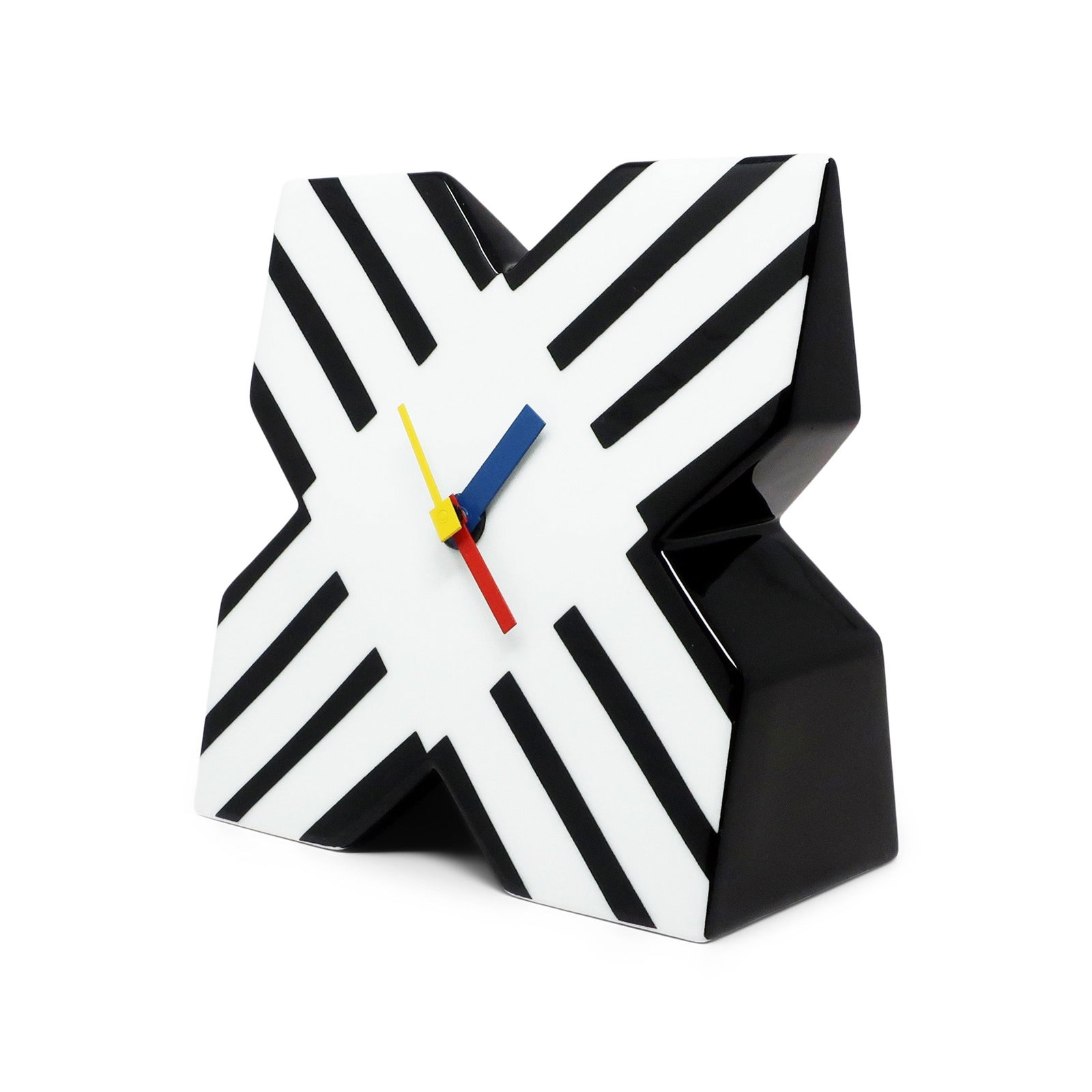 Postmodern Procelain Clock by Marcello Morandini for Rosenthal Studio Line: A fantastic porcelain desk or table clock by Italian designer Marcello Morandini for German ceramics powerhouse Rosenthal for their designer focused Studio Line. Black and white graphic on an X shape 