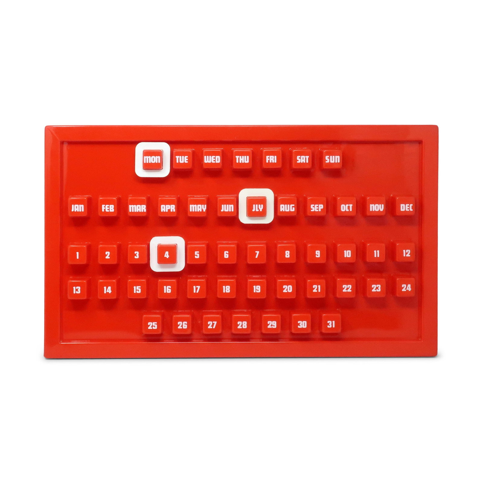 1970s Red Plastic Perpetual Calendar: A fantastic example of 1970s mod design, this bright red plastic perpetual wall calendar delivers bold graphic impact. Molded from glossy red plastic with white printed labels, the calendar features r