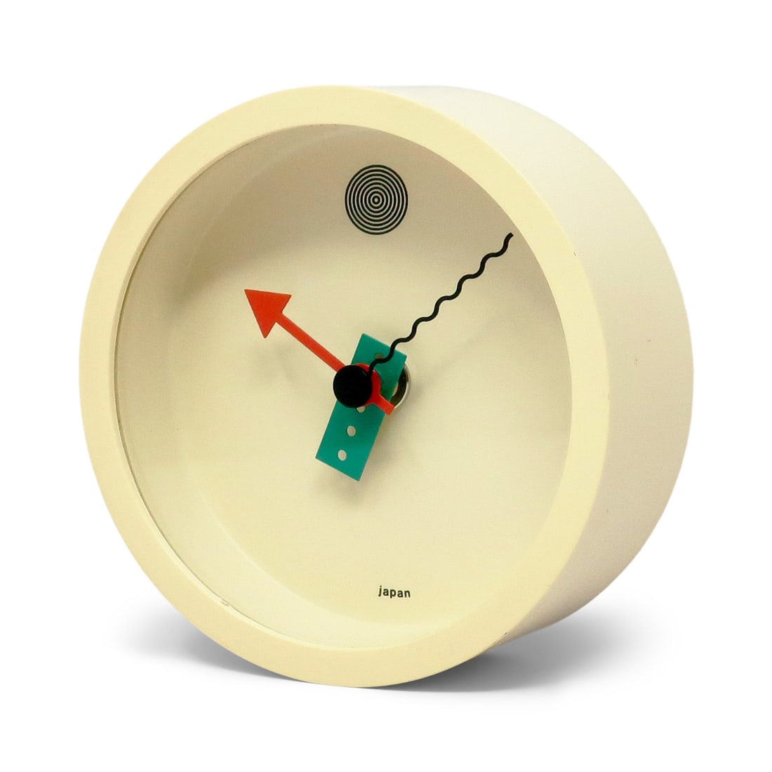 1980s White Postmodern Wall Clock by Shohei Mihara for Wakita: A perfectly elegant and sophisticated 1980s wall clock designed by Shohei Mihara for Wakita. Postmodern, Memphis Group-influenced design at its finest! White with red, green, and yellow black. This