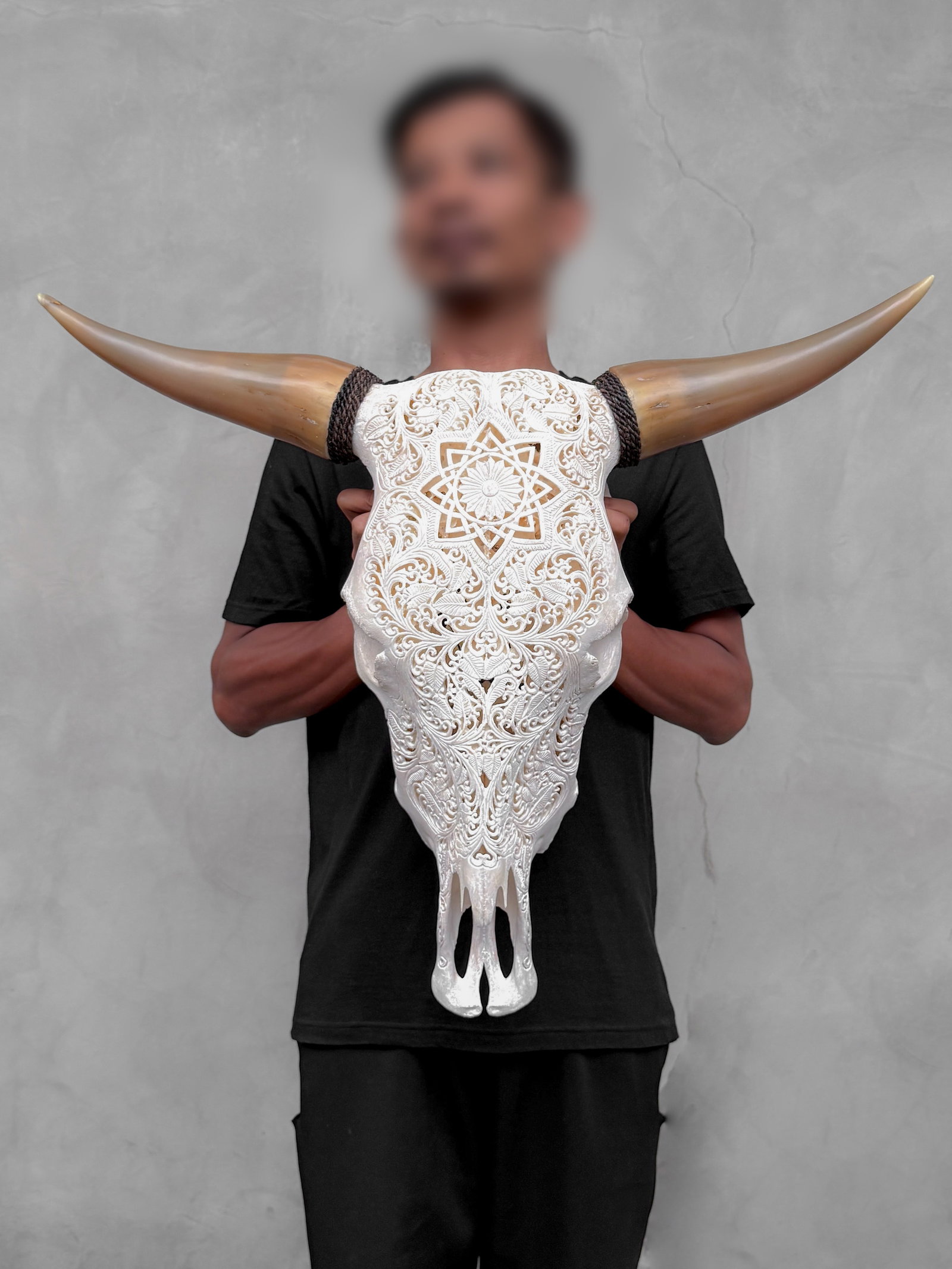 Brown bull's skull - Star mandala motif with turquoise inlay: Title: Brown bull's skull - Star mandala motif with turquoise inlay Maker:Unknown Origin: Indonesia Date/Period:2026 Materials:Bos Taurus, bone, horn Dimensions:Height: 56 cm / 22 inches. Length: 66