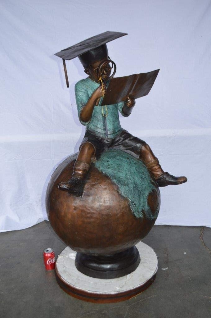Student learning on top of world bronze statue - Size: 28"L x 24"W x 52"H. - 5