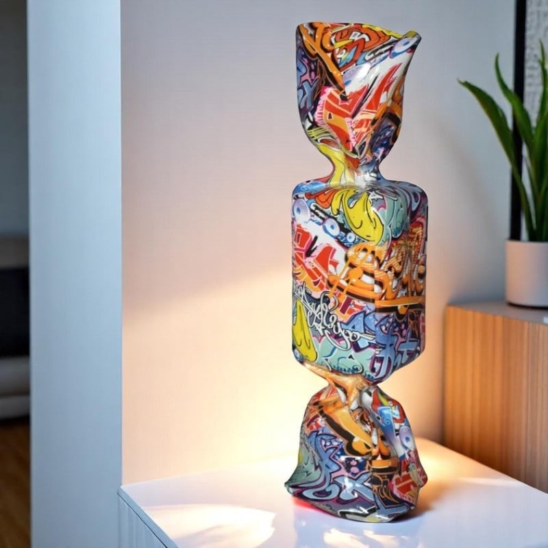 Modern Art of a Large Graffiti Candy Statue Made of Resin Size: 9" x 8" x 24"H: Title:Modern Art of a Large Graffiti Candy Statue Made of Resin Size: 9" x 8" x 24"H Description:Enjoy this Modern Art of a Large Graffiti Candy Statue Made of Resin. This modern abstract would be a