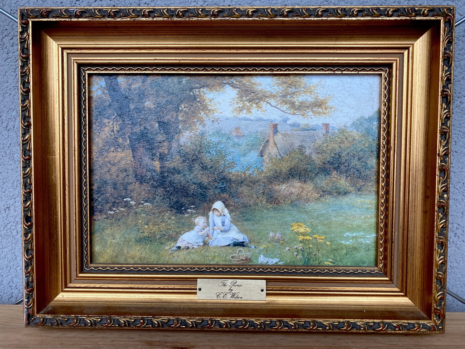Antique framed painting by C.E.Wilson - The Picnic: Title: Antique framed painting by C.E.Wilson - The Picnic Maker:CONSORT PICTURES C.P.PRODUCTIONS LTD Origin: IRELAND Date/Period:Unknown Materials:Wood, Canvas Size:Size: 37 x 26 x 4 cm