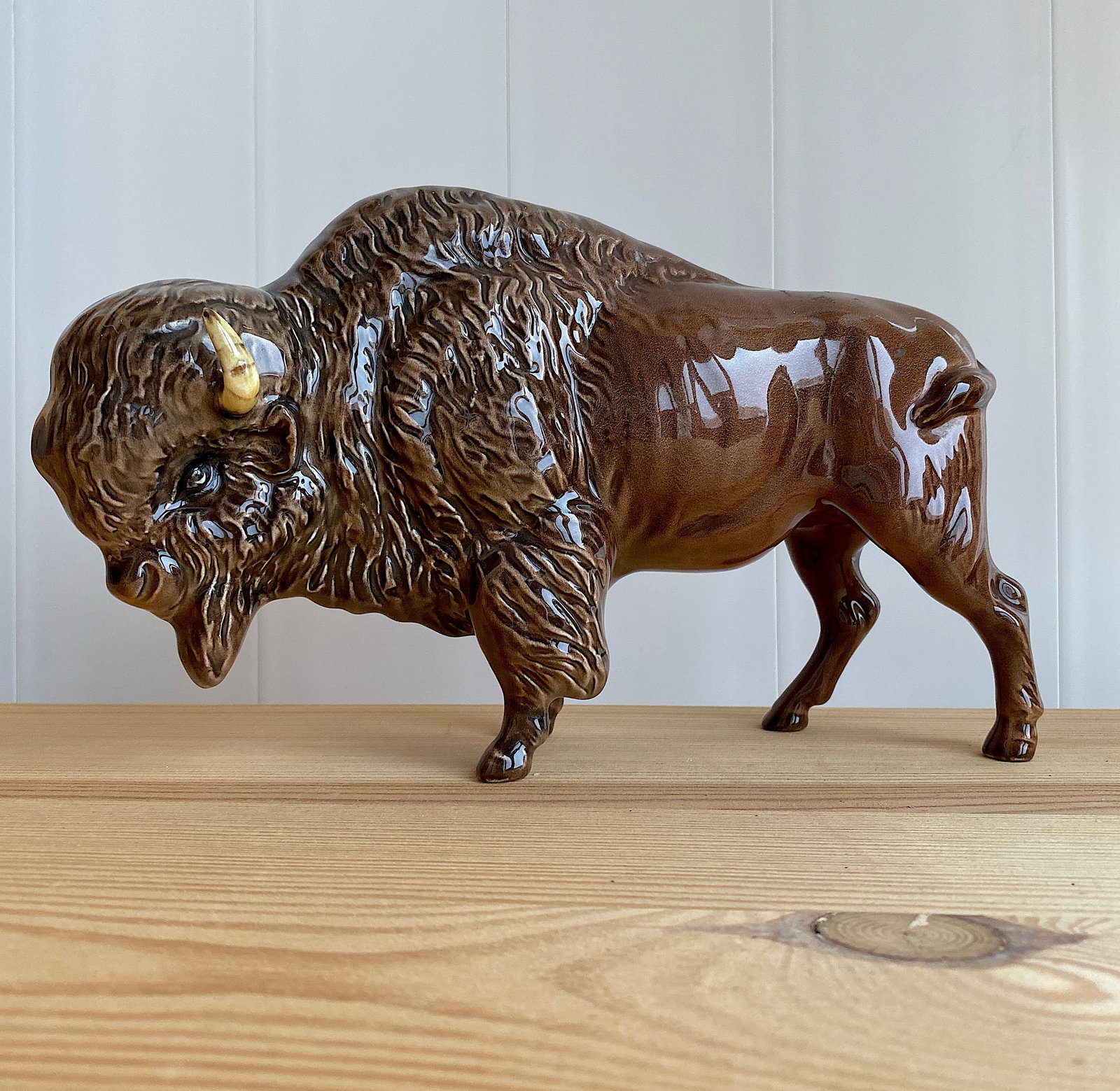Signed Porcelain Bison Statue: Title: Signed Porcelain Bison Statue Maker:Arthur Gredington Origin: England Date/Period:Unknown Materials:Porcelain Size:Size: 23 x 8 x 15 cm Description:Signed Porcelain Bison StatueSize: 23 x 8 x