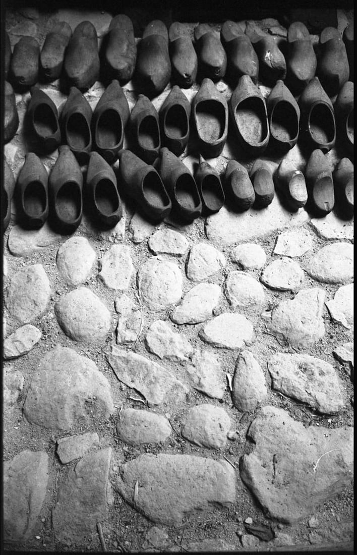 Clogs, Jardin Des Renaudies, France 2019 - Silver Gelatin Photograph: Title: Clogs, Jardin Des Renaudies, France 2019 - Silver Gelatin Photograph Dimensions: 15.7 x 19.7 in Medium: Clogs, Jardin Des Renaudies, France 2019 - Silver Gelatin Photograph - Limited Edition of