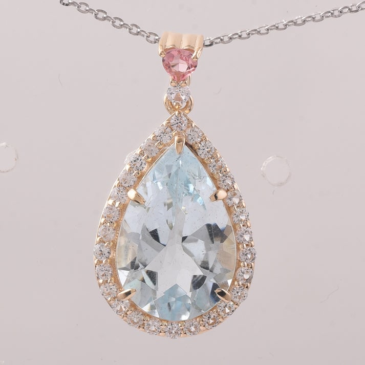 5.20 Ct Pear Aquamarine 9K Gold Pendant: 5.20 Total Carat Aquamarine 9K Gold Pendant Specifications: Total Weight 2.299 g Center Gemstone Aquamarine Gemstone Carat Weight 4.56 Carats Gemstone Measurements 15.10X10.10X6.10 mm Additional Gemst