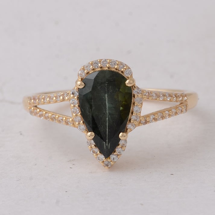 1.55 Ct Pear Tourmaline 9K Gold Ring: 1.55 Total Carat Tourmaline 9K Gold Ring Specifications: Total Weight 2.009 g Center Gemstone Tourmaline Gemstone Carat Weight 1.32 Carats Gemstone Measurements 10X6X4.30 mm Additional Gemstones