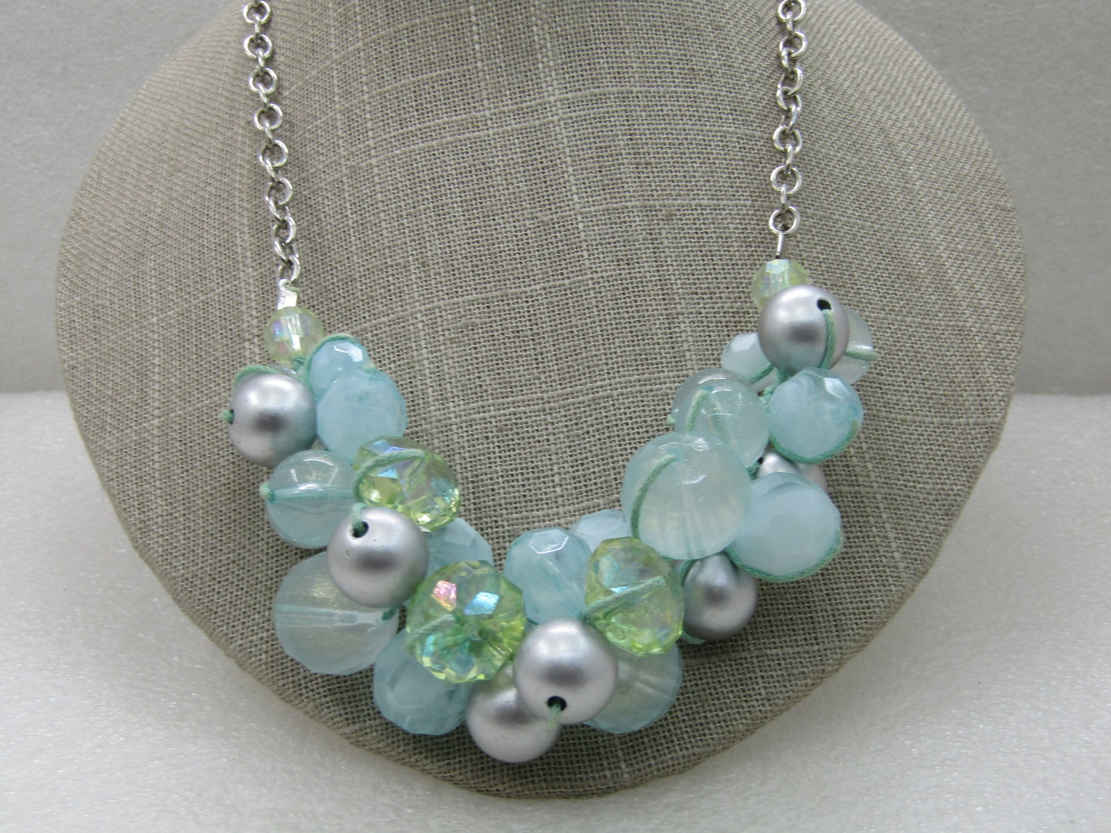 Vintage Baby Blue & Green Necklace, Cluster Beaded, 18" plus 3" Extender: Vintage Baby Blue & Green Necklace, Cluster Beaded, 18" plus 3" Extender. Cluster of clear and cream baby blue faceted and rounded beads with some clear gliterry beads and silver tone metallic beads