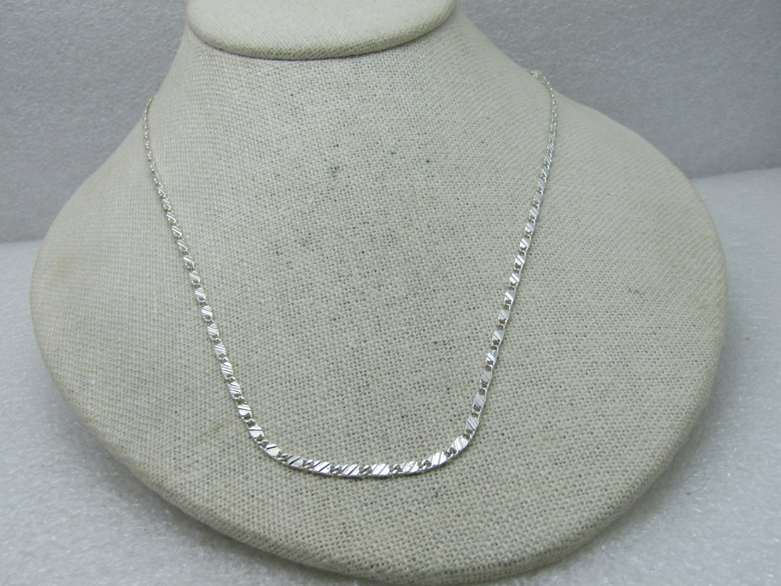 Vintage 20" Ridged Link Necklace, 3mm Wide, 1980's-1990's: Vintage 20" Ridged Link Necklace, 3mm Wide, 1980's-1990's rectangular link design with two diagonal ridges aross each link, lobster clasp. Not signed by maker. Silver tone plated tarnish-resistant tre