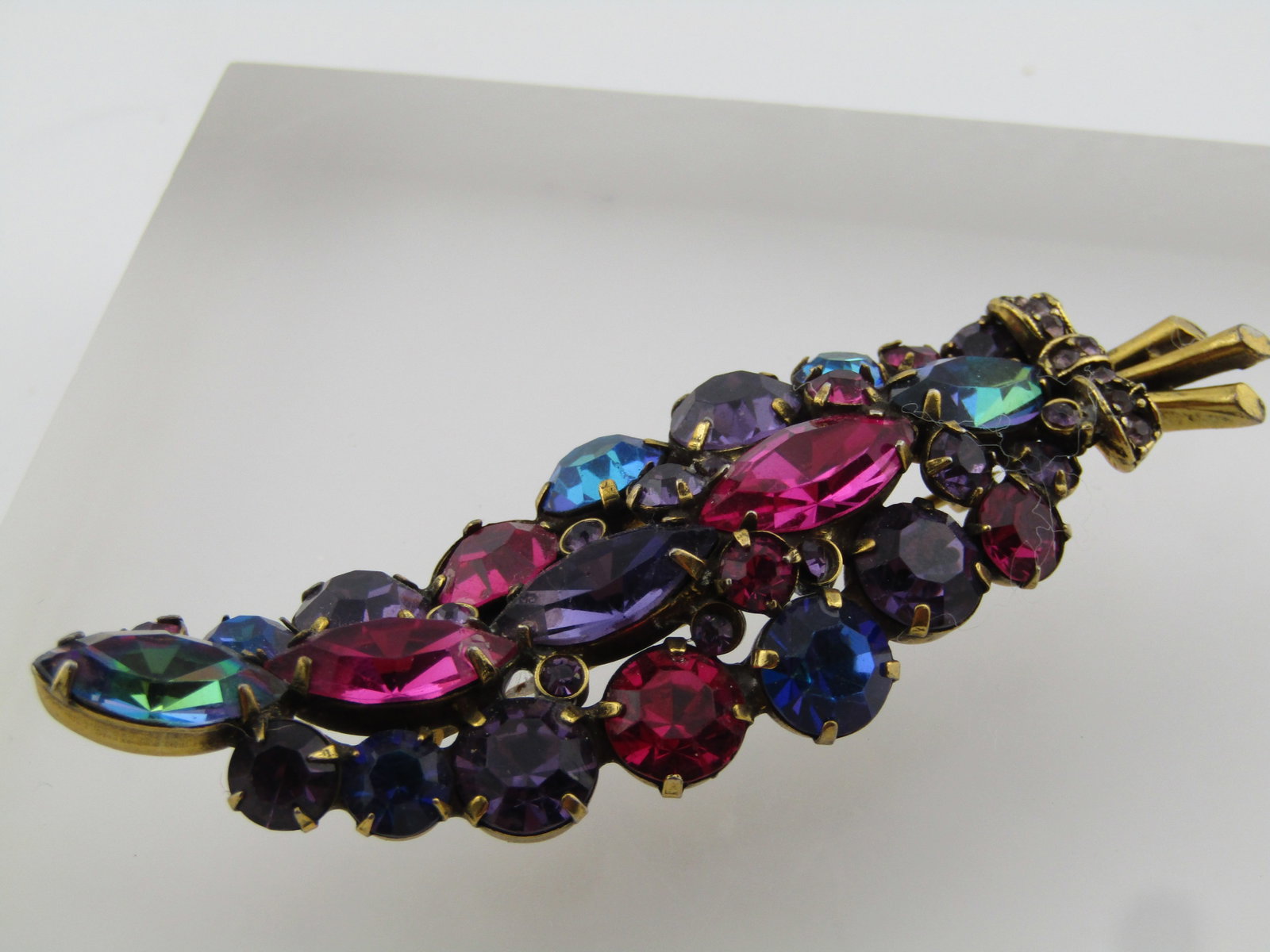 Vintage Rhinestone Stem Brooch, Mixed Gemtones, WEISS, Mid-Century: Vintage Rhinestone Stem Brooch, Mixed Gemtones, WEISS, Mid-Century. Brassy gold tone with prong-set round glass faceted stones in gemtone colors - marquise, round in varous sizes - some bezel set.