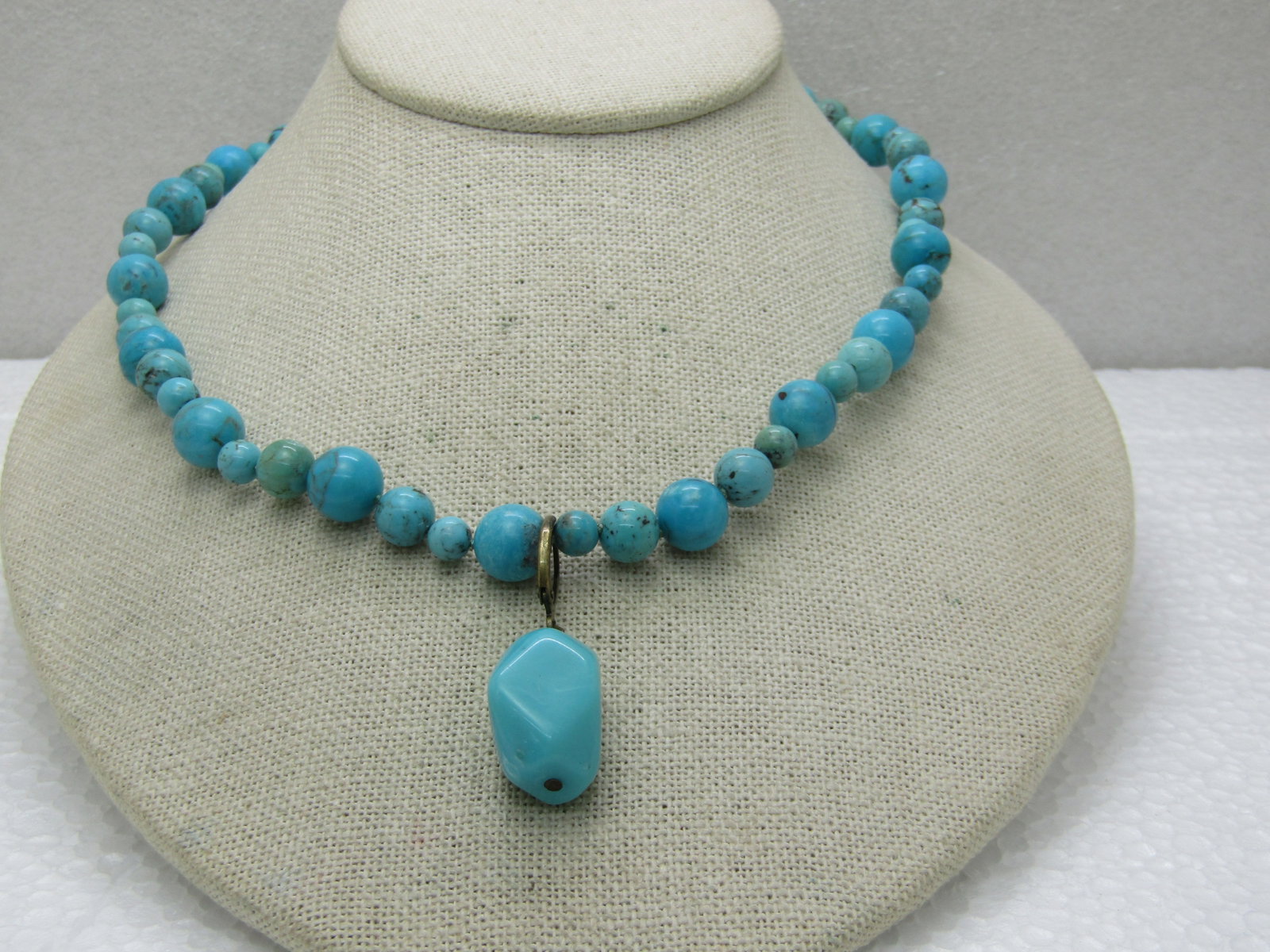 Southwestern Turquoise Beaded Necklace with Sterling Lobster Clasp, 18", Knotted Between Beads: Southwestern Turquoise Beaded Necklace with Sterling Lobster Clasp, 18", Knotted Between Beads - the beads are a mix of 6mm, 8mm and 10mm round beads. They seems to be a mix of natural turquoise beads
