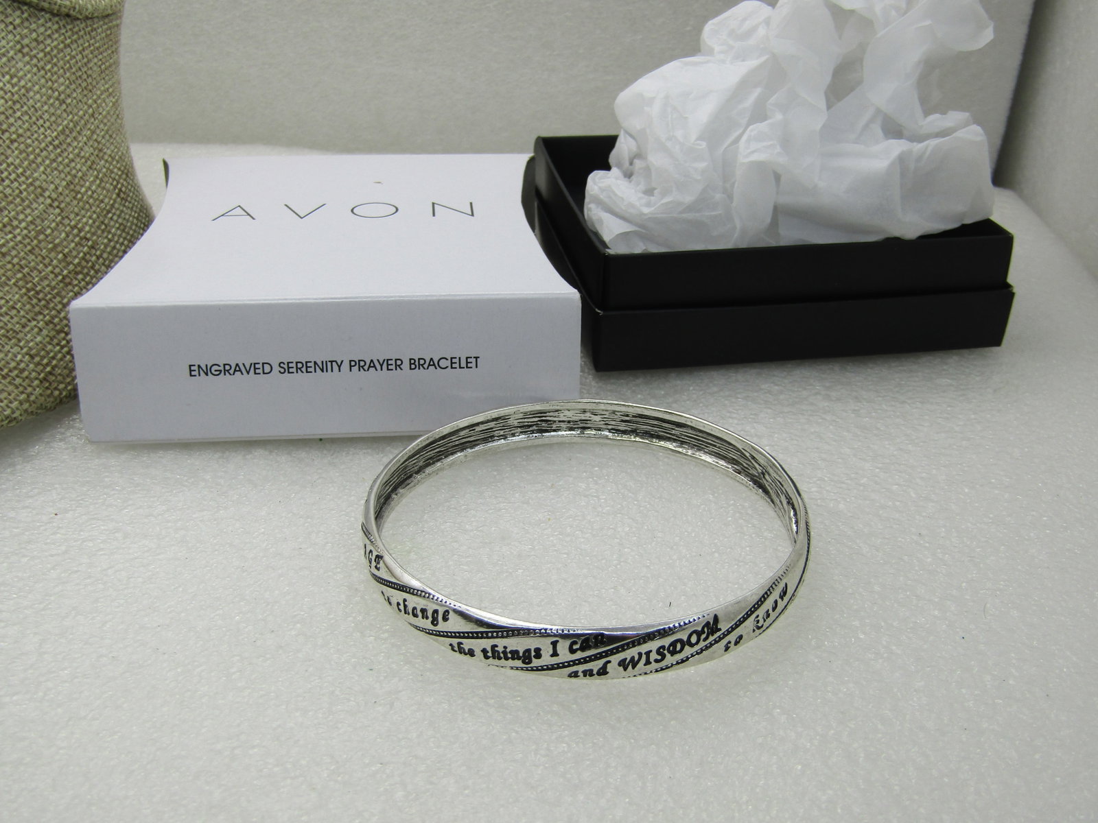Avon Engraved Serenity Prayer Bangle Bracelet, 8.25" 2.75" Opening: Avon Engraved Serenity Prayer Bangle Bracelet, 8.25" 2.75" and 9mm wide, slightly domed. Opening, Silver tone with engraved blackwashed lettering of the Serenity prayer. New stock in original box with