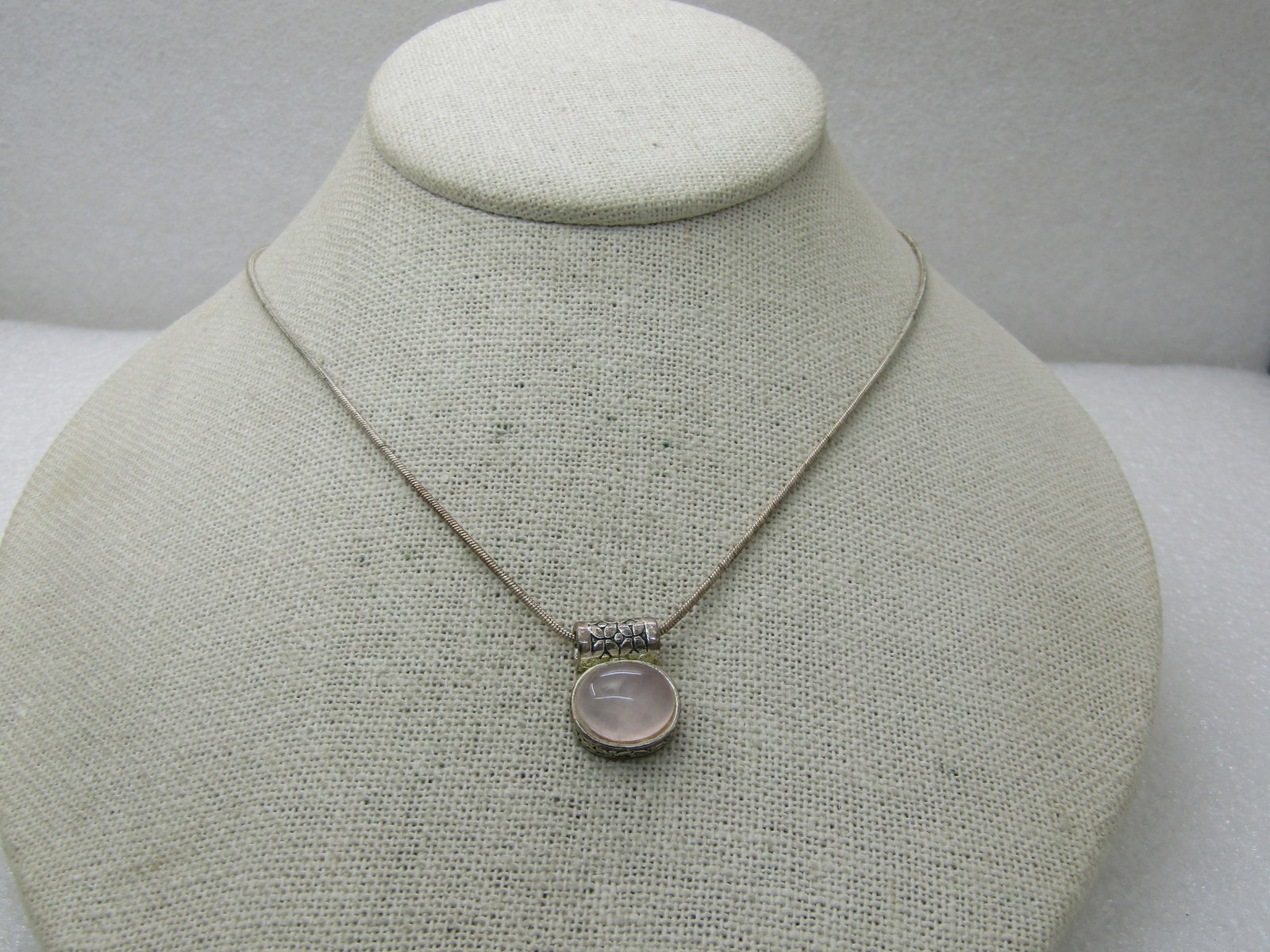 Vintage Silver Tone White Stone Necklace, Bali-Style 16": Vintage Silver Tone White Stone Necklace, Bali-Style 16" Snake Chain that is appx. 1.3mm wide. Lobster clasp. Southwestern look too. Slide pendant that is appx. 5.8" wide and short short of 3/4" long 