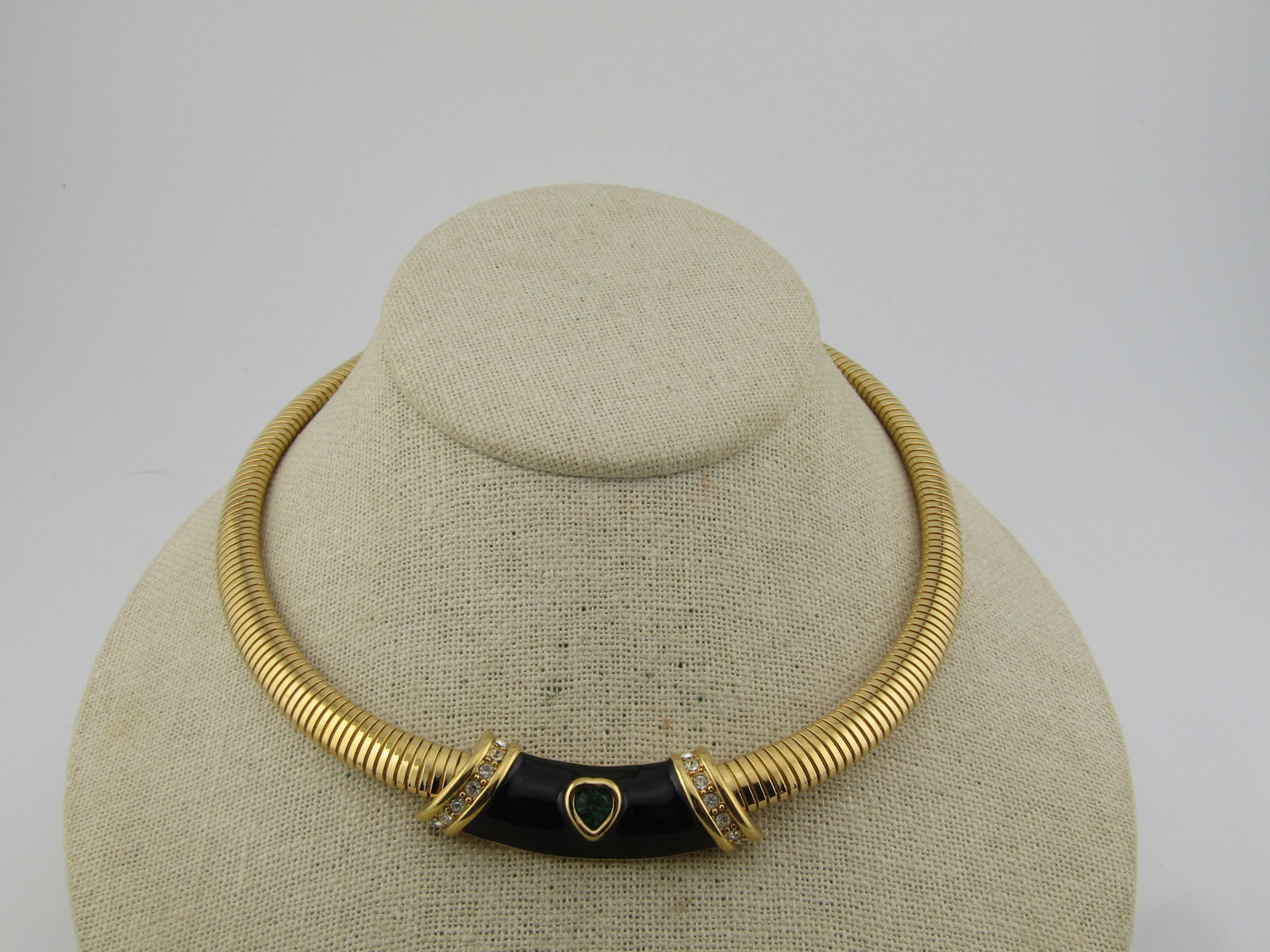 Vintage Monet Omega Necklace, Enameled & Rhinestones, 1980's, 17": Vintage Monet Omega Collar Necklace, Enameled & Rhinestones, 1980's, 17". This is appx. 8mm wide at the omega gold tone necklace and clasp with a front piece that is slightly wider at 13.5mm - it look