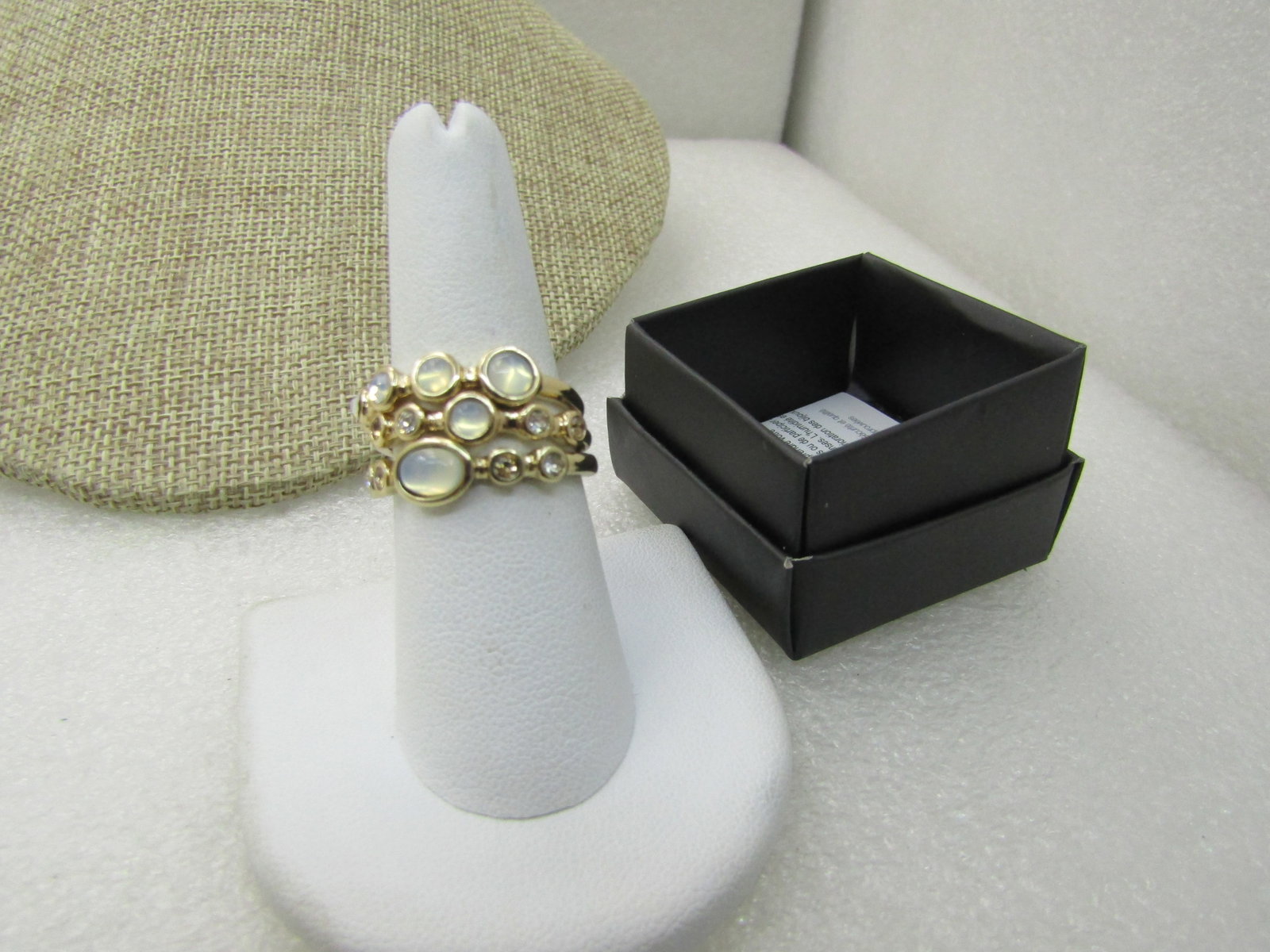 Avon Opalescent Stacking Ring Set Sz 6, In Original Box, New: Avon Opalescent Stacking Triple Ring Set Sz 6, In Original Box, New. Each ring has faux opal stones with rhinestiones and stack nicely together. 2019. From former seller's inventory. New condition,