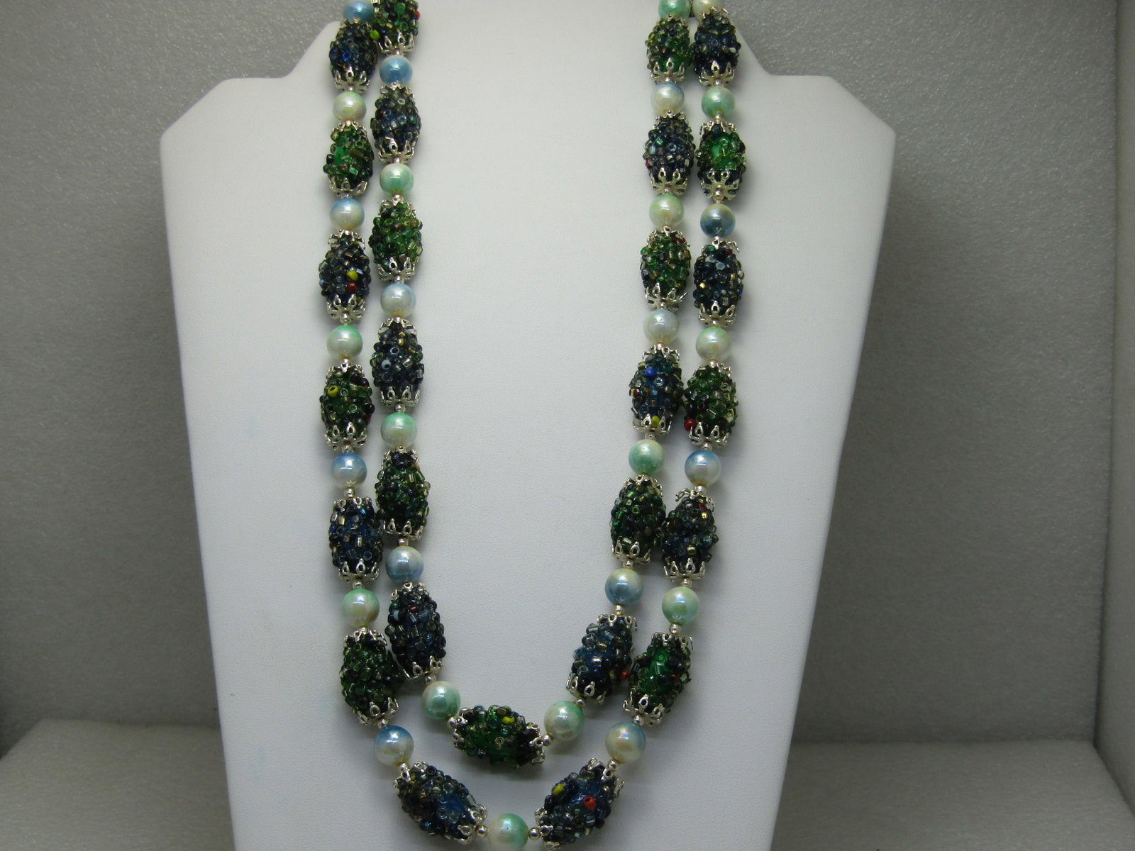 Vintage Seed Bead Encrusted Beaded Necklace, Double Strand, 24", Box Clasp, 1940's-1950's: Vintage Seed Bead Encrusted Beaded Necklace, Double Strand, 24", Box Clasp, 1940's-1950's. Glass seed beads are attached to beads that have blue and green under the beads. Between these encrusted