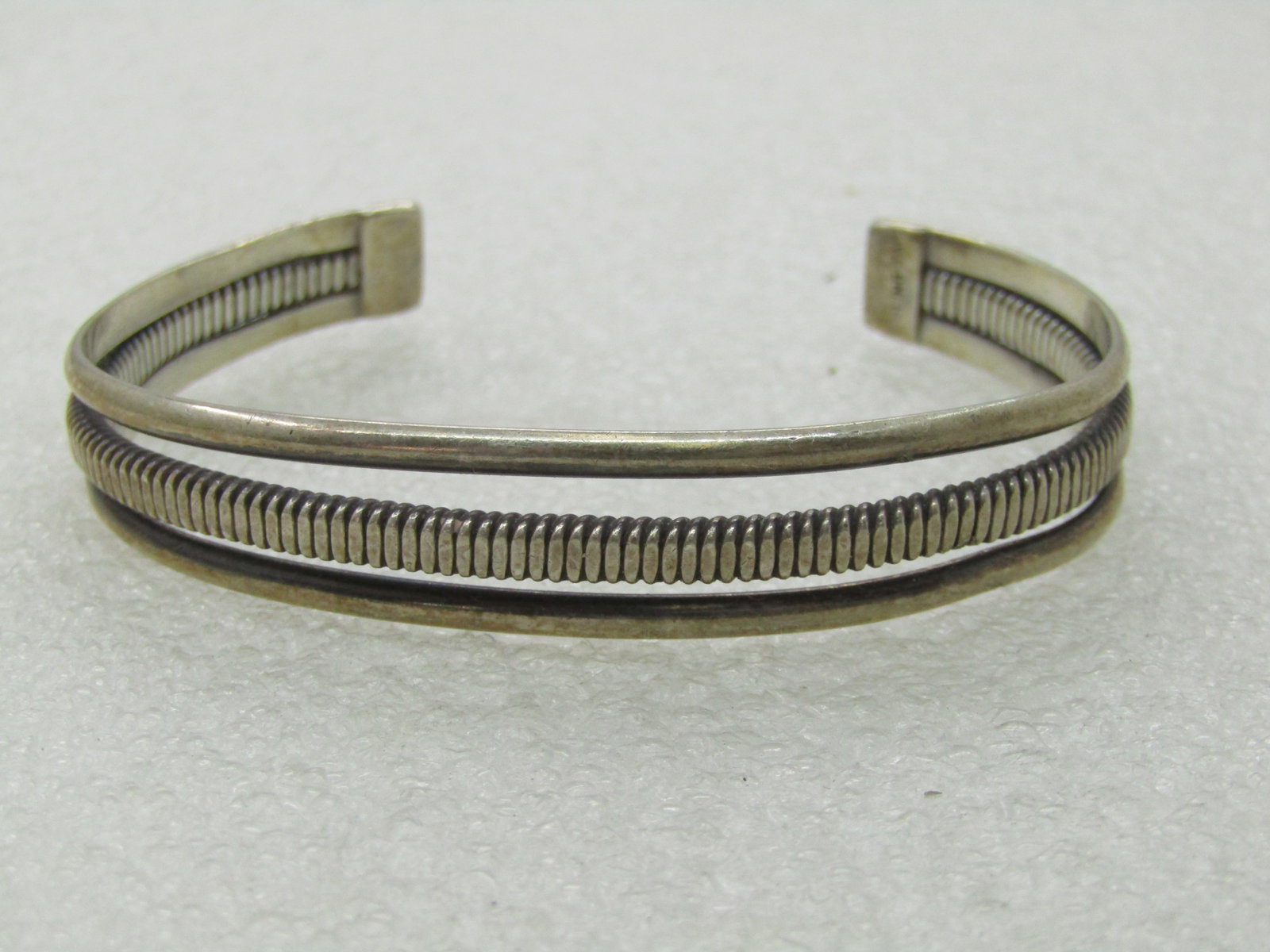 Vintage Sterling Southwestern Cuff Bracelet, three Bands, 6.25: Vintage Sterling Southwestern Cuff Bracelet, three Bands, 6.25". This is appx. 11.5mm wide and tapers to 8mm at the back of the wrist. The inside measurement is 5.5" with a 1.25" opening at back - it 