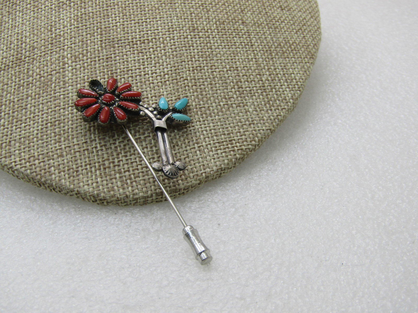Vintage Sterling Southwestern Coral & Tuquoise Stick Pin, Missing 1 Stone: Vintage Sterling Southwestern Coral & Tuquoise Stick Pin, Missing 1 Stone. this has a 3/4" coral blossom that is missing one elongaged teardrop stone tha is appx. 6mm by 2.5mm. There is a stem like ac