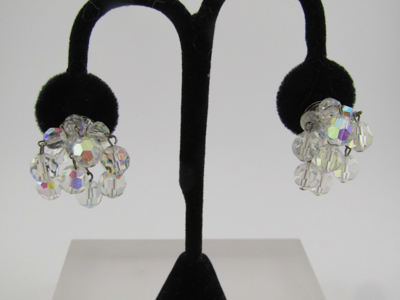 Vintage Clear Aurora Borealis Crystal Stud Drop Earrings, Mid-Century, Pierced: Vintage Clear Aurora Borealis Crystal Stud Drop Earrings, Mid-Century, Pierced. These earrings have a silver tone back with silvertone connectors stringing the beads that are appx. 5.5mm closest to th