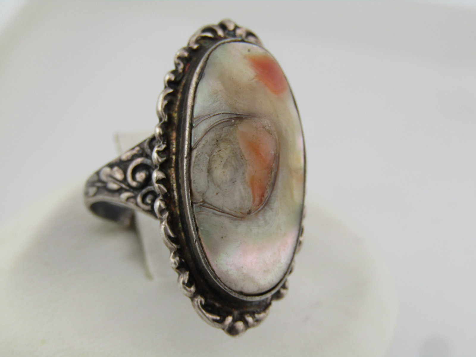 Vintage Sterling Blister Pearl Ring, Sz. 6.25, 1940's-1950's,: Vintage Sterling Blister Pearl Ring, Sz. 6.25, 1940's-1950's, This has a long oval blister pearl that is bezel-set and appx. 23mm by 11mm. It is set on a wider scrolled frame. The ring is appx. 28mm