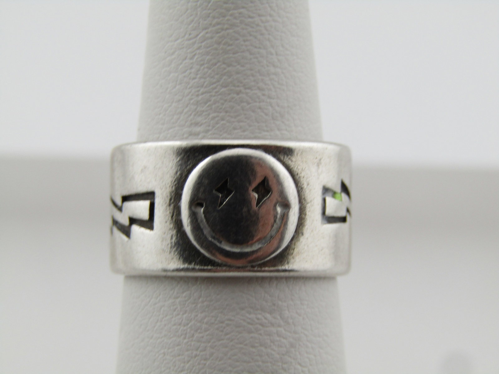 Silver Smile, Lightening, Stars Ring, Size 6, 1990's: Silver Smile, Lightening, Stars Ring, Size 6, 1990's. Slightly adjustable. This is marked .925 but does not test as sterling - it seems to be more like stainless steel. It is 10mm wide. It has a
