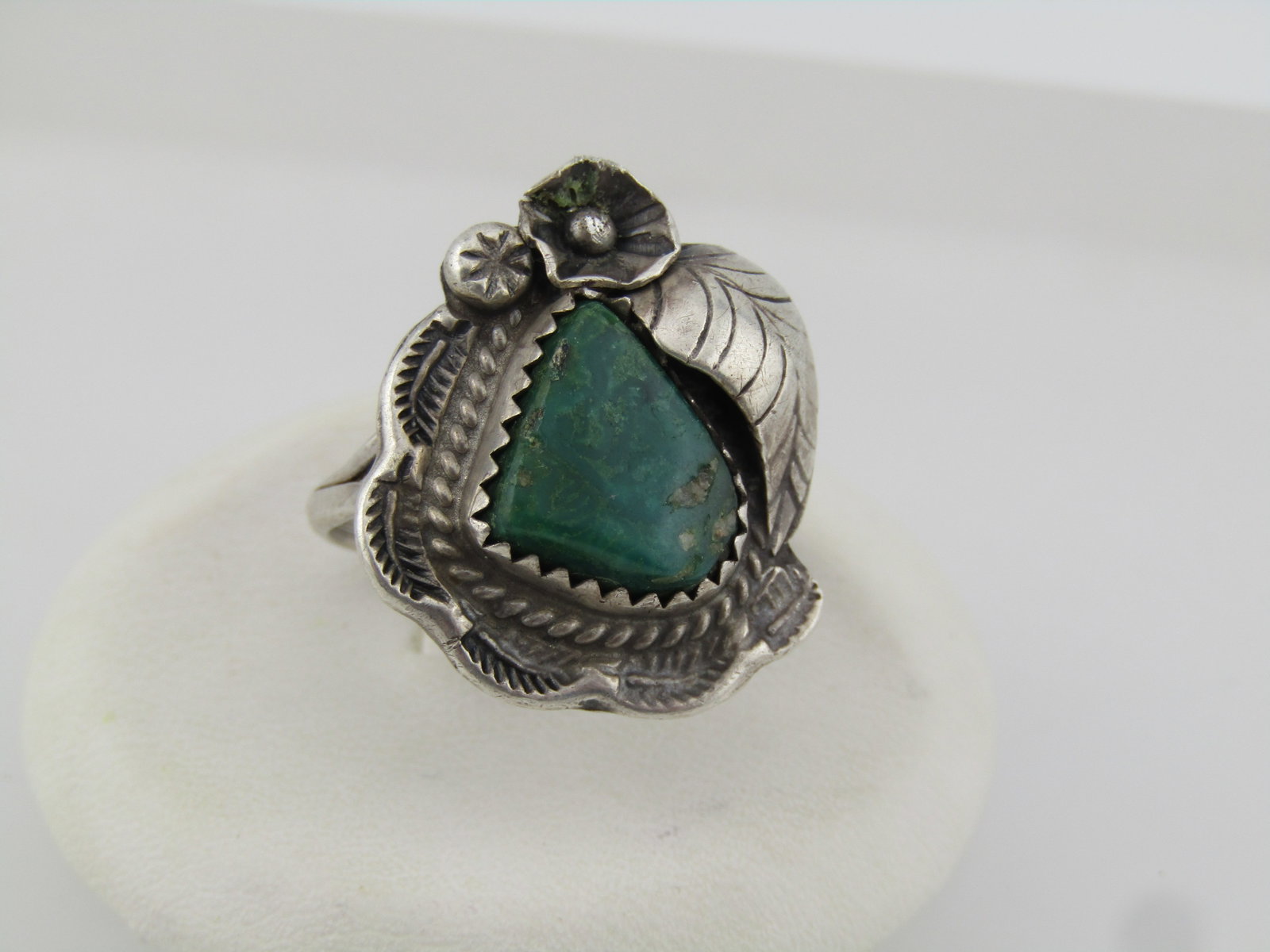 Vintage Sterling Southwestern Green Stone Ring, Sz. 6, 1960's-1970's: Vintage Sterling Southwestern Green Stone Ring, Sz. 6, 1960's-1970's. This stone is triangularish in shape and sawtooth bezel-set, appx. 10.8mm by 10.5mm. It seems to be a natural stone but may not
