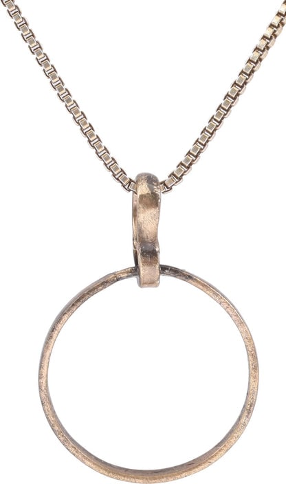 VIKING BEARD RING NECKLACE, 9TH-11TH CENTURY: Round with rounded face, 0.54” inside diameter and 0.59” outside. The use of beard rings by Vikings is well documented though very few genuine examples survive. Surface textured from